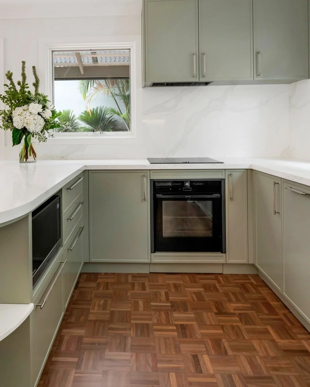 Soft green cabinetry, crisp stone and the original timber flooring give this Greenwich kitchen its character.

A fresh, considered palette that feels calm, practical and connected to the home.

Project Greenwich
Designed by Hargroves Design Consultan