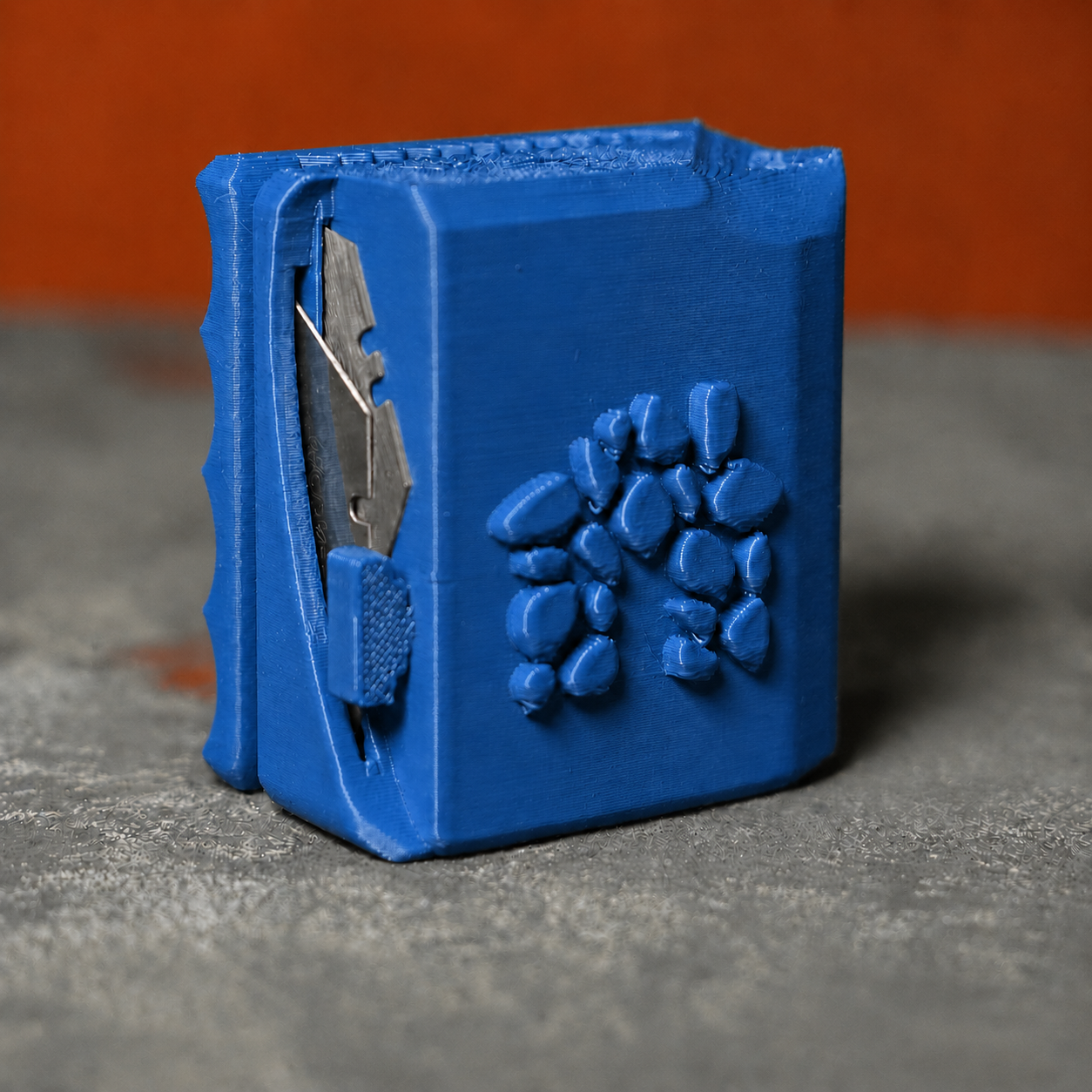 leather-strap-cutter-handheld-tool-blue.png