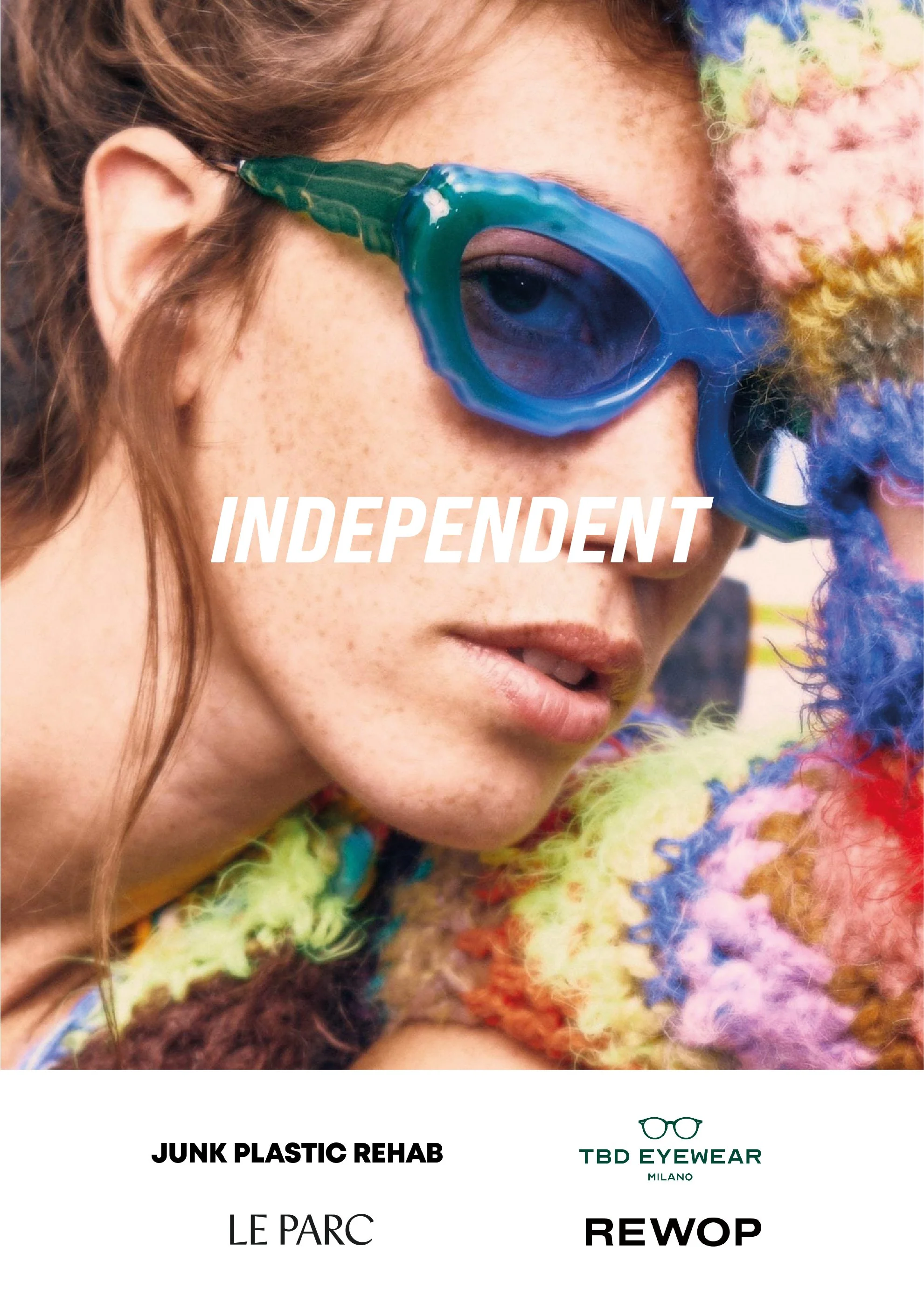 Close-up of a woman wearing colorful glasses with the text 'Junk Plastic Rehab', 'LE PARC', 'REWOP', and other brand logos and names on the bottom of the image.
