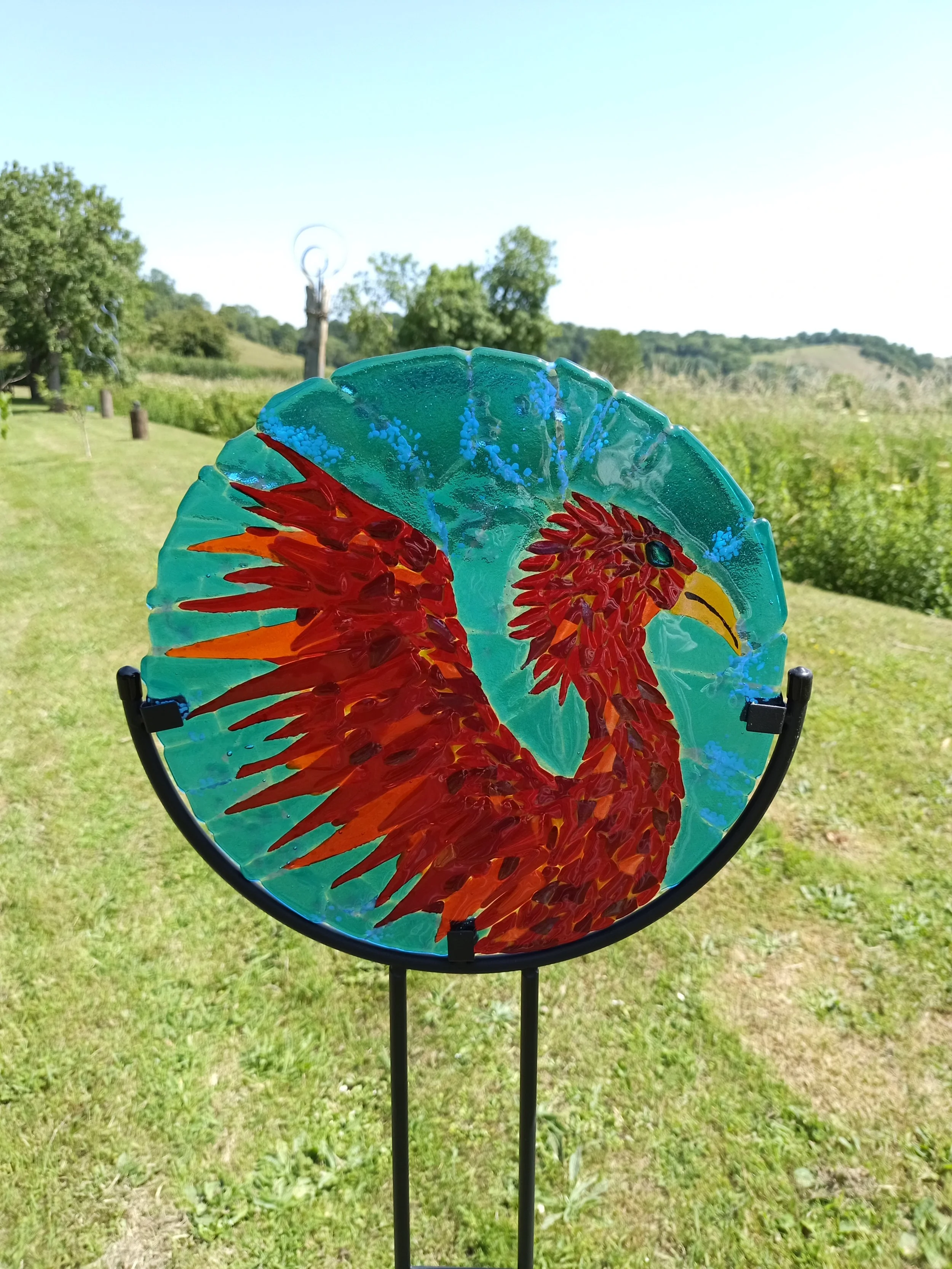 Fused glass Phoenix in garden stand