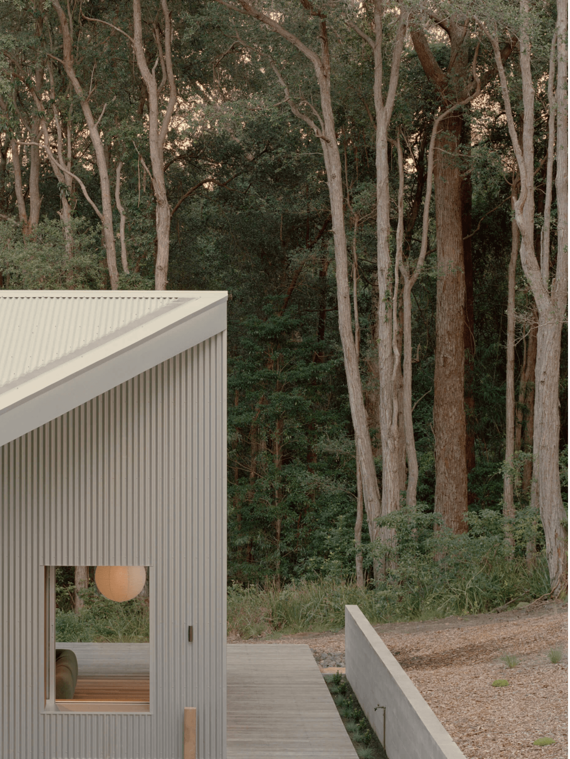 Ironbark House exterior detailing. Clad in corrugated Zincalume steel, selected for its resilience and low maintenance in a coastal climate.