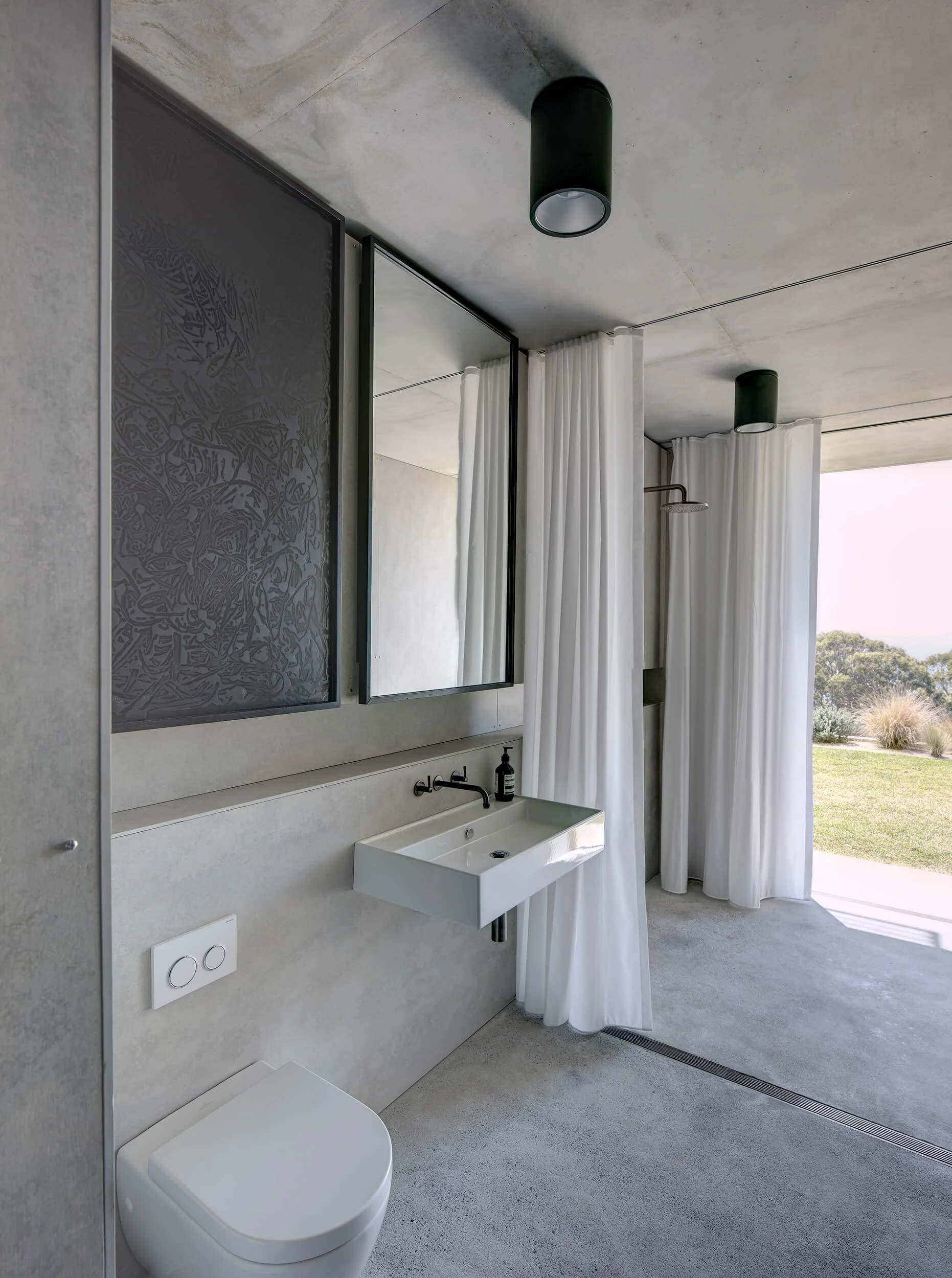 Open flow bathroom with lake views, NSW