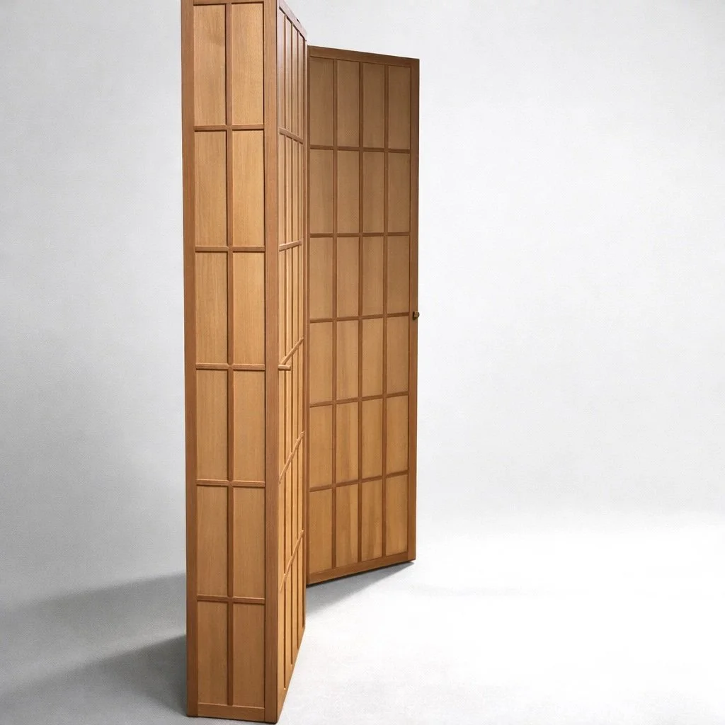 Two wooden cabinets against a plain white wall.