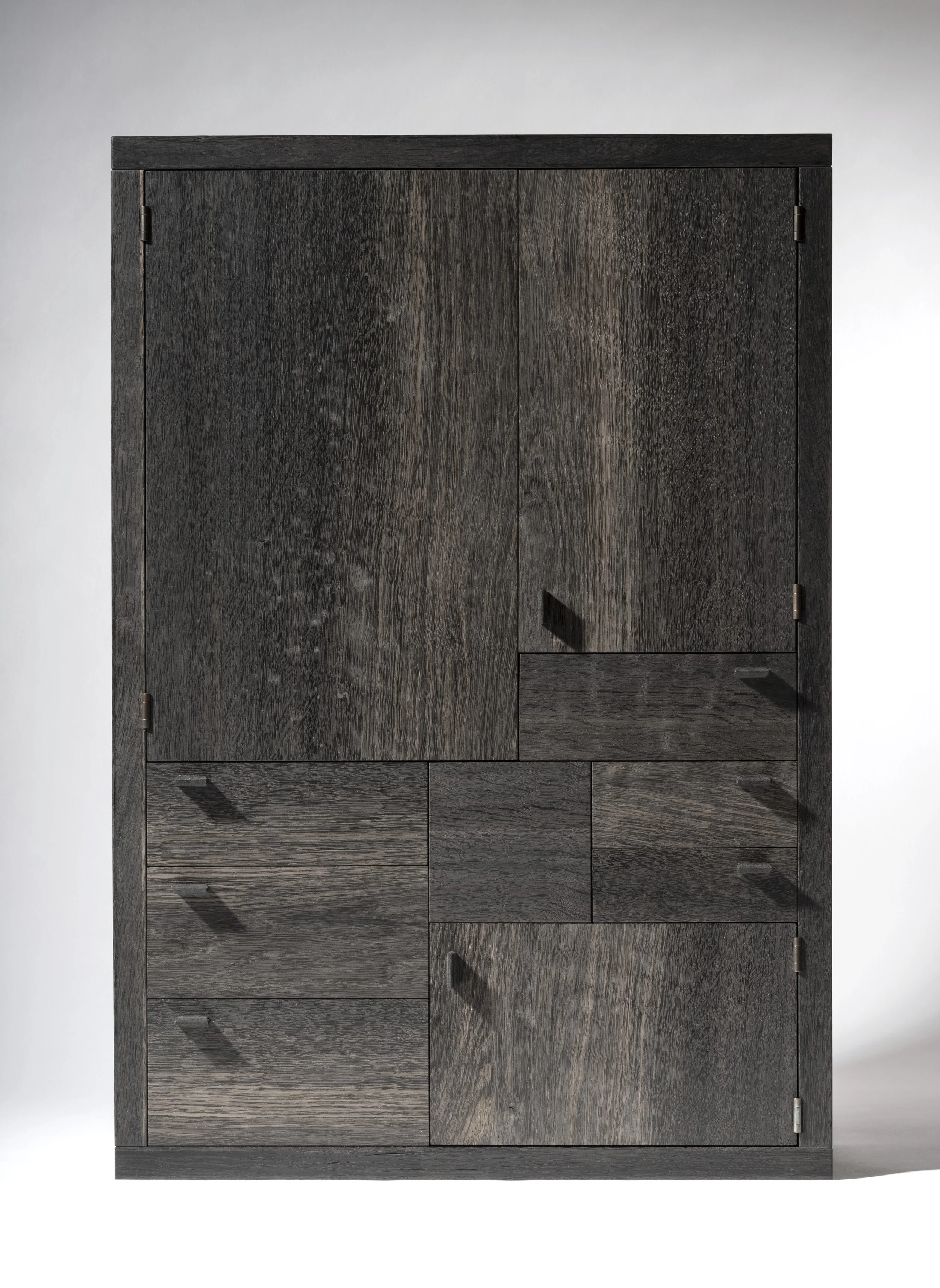 A black wooden cabinet with multiple compartments and doors.