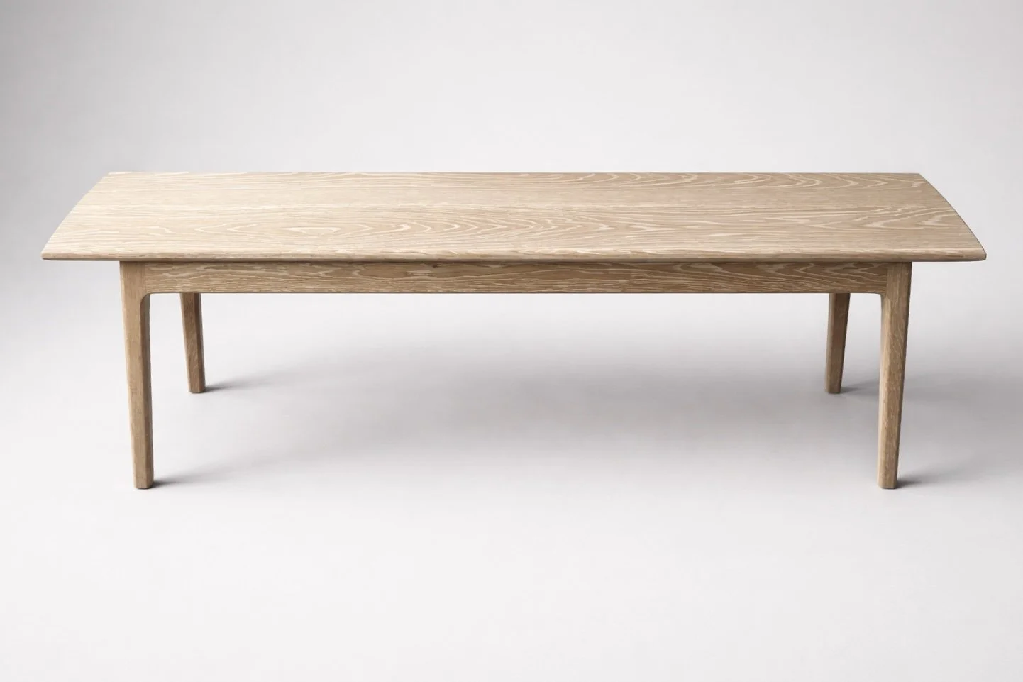 A wooden bench with a simple, natural finish, set against a plain white background.