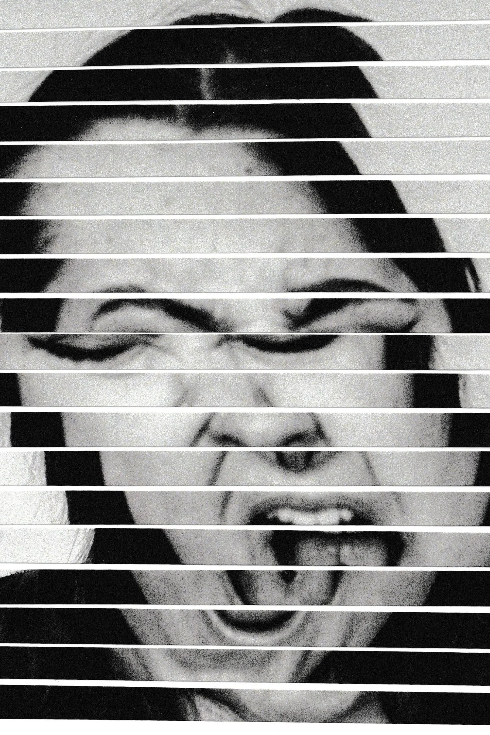 A black and white photograph of a woman's face, seen through horizontal window blinds, with her mouth open and tongue sticking out.