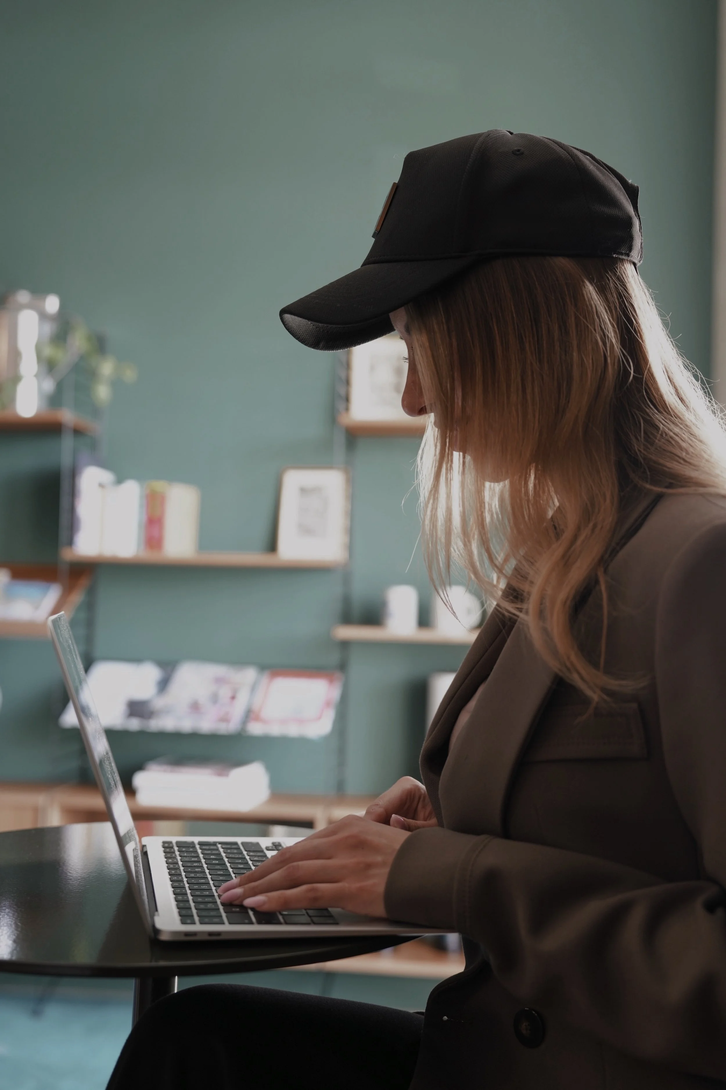 Bespoke content planning and management showcasing work on a laptop in a sophisticated envinronment that represents our brand identity.