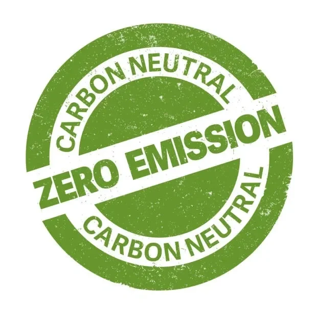 Green circular logo with distressed texture, stating "Zero Emission" and "Carbon Neutral" twice