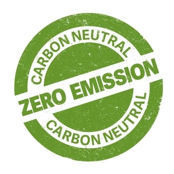 Green circular badge with white and darker green text stating 'Carbon Neutral Zero Emission'.