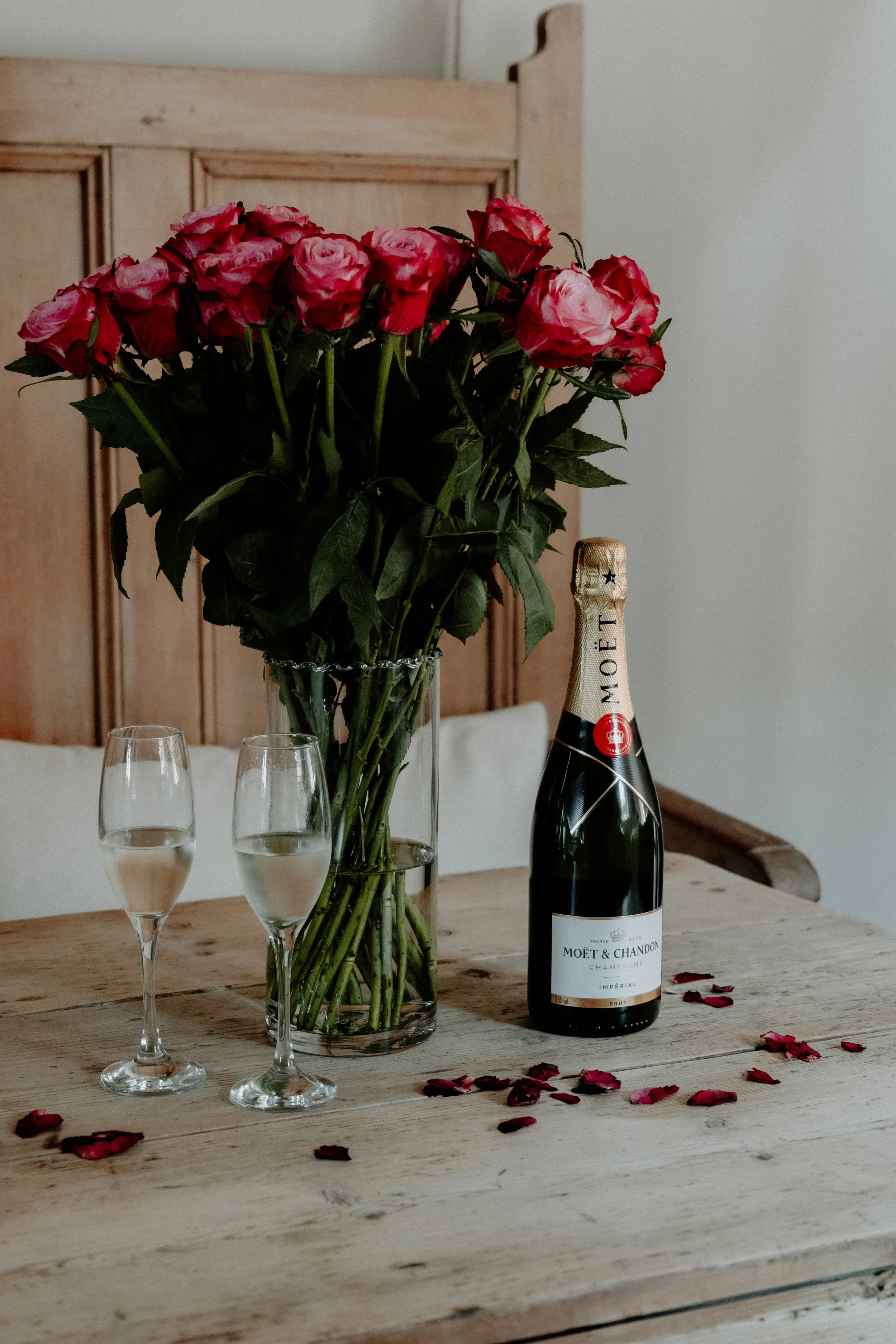 Chilled champagne and roses set up at Cedar Cottage, a romantic Derbyshire holiday cottage.  e