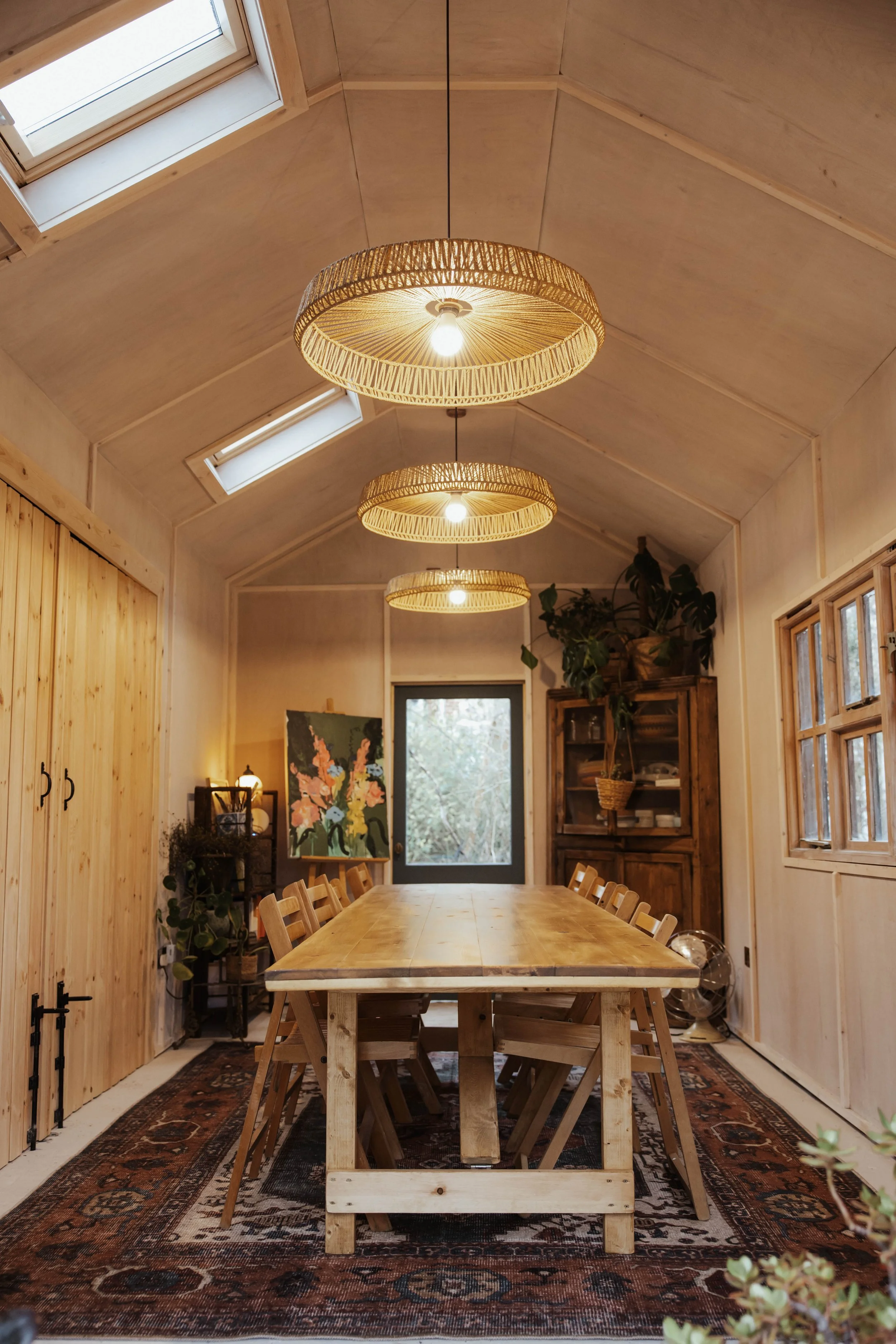 The Creative Pause studio - based in Norwich - a calm and serene workshops space with a large table down the centre and refined bohemian interiors