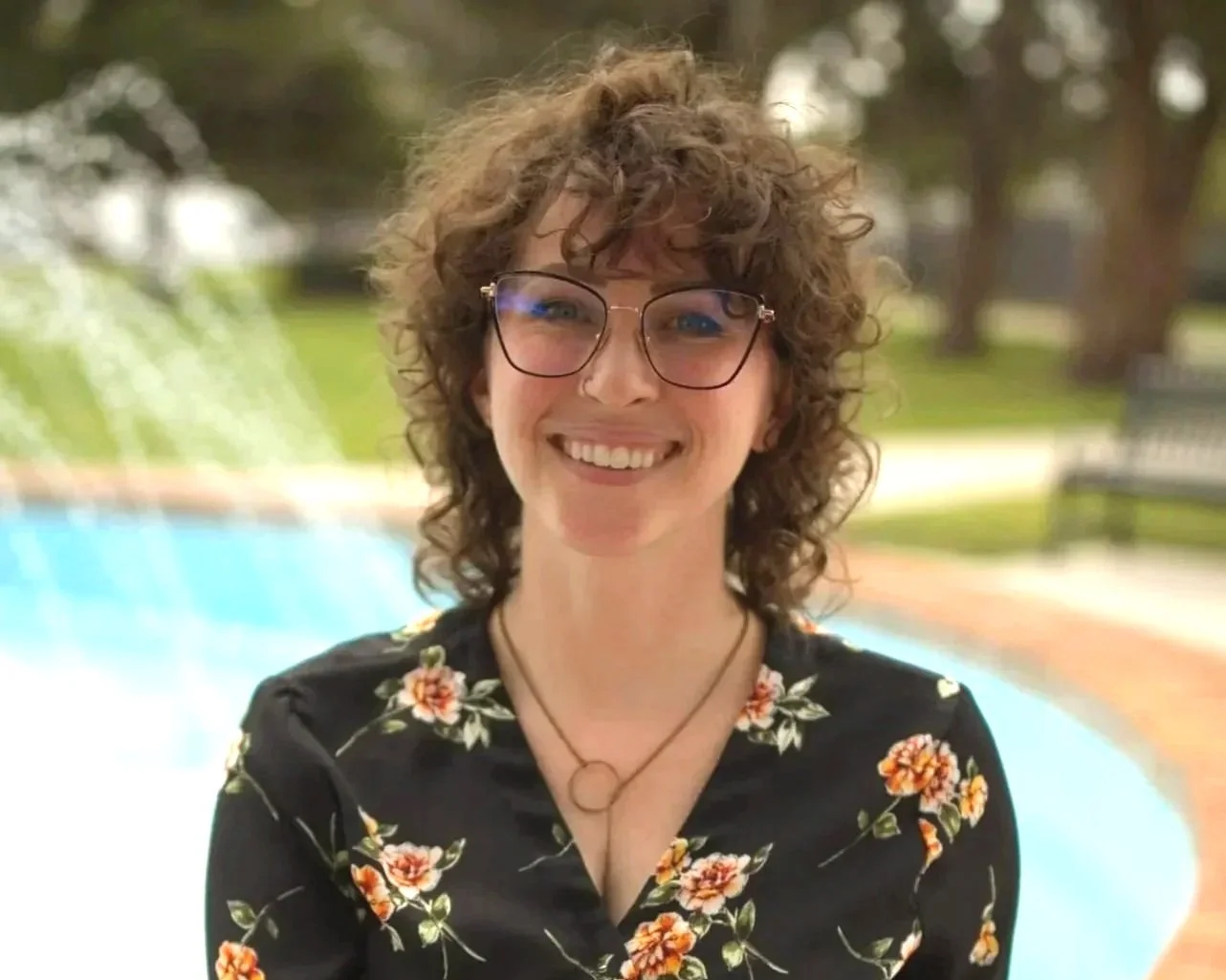 Professional headshot of Taylor Nelms, LMHC, providing specialized therapy for high-achievers in Florida.