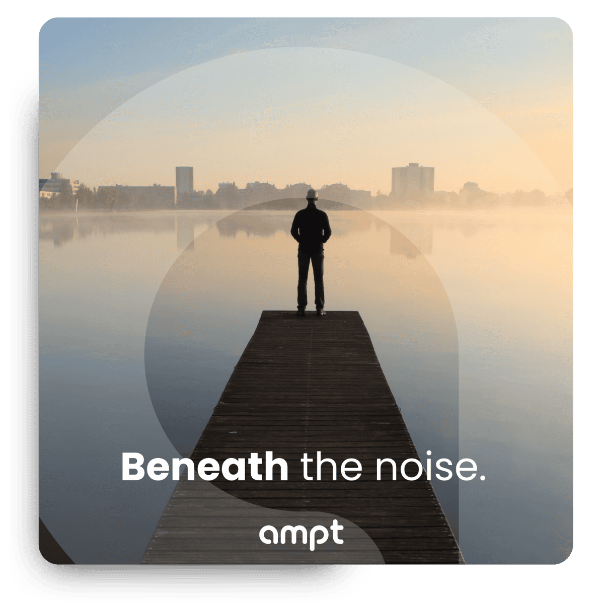 Person standing on a wooden dock overlooking a calm river at dawn, with city buildings in the distance, and the phrase "Beneath the noise."