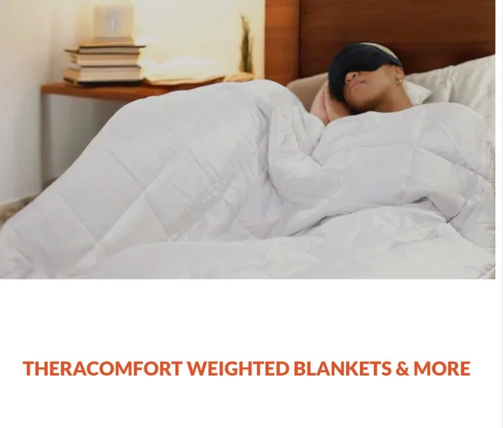 Person sleeping in bed with a black Therasage red light therapy sleep mask, covered by a white quilt, in a cozy bedroom with a wooden headboard and a bedside table with books and a small plant.