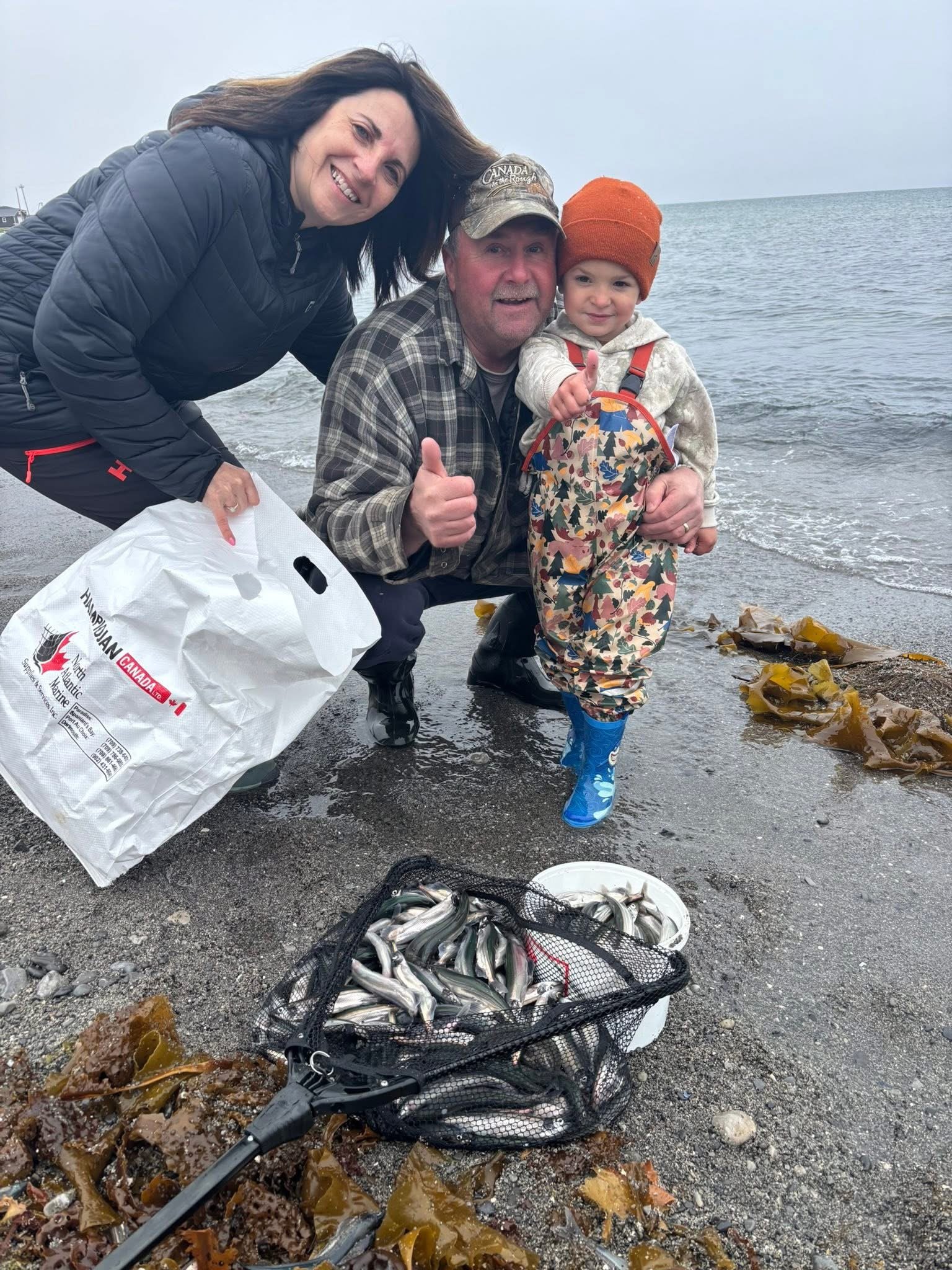 Community members Rosie and Colby Cullihall with Bennett