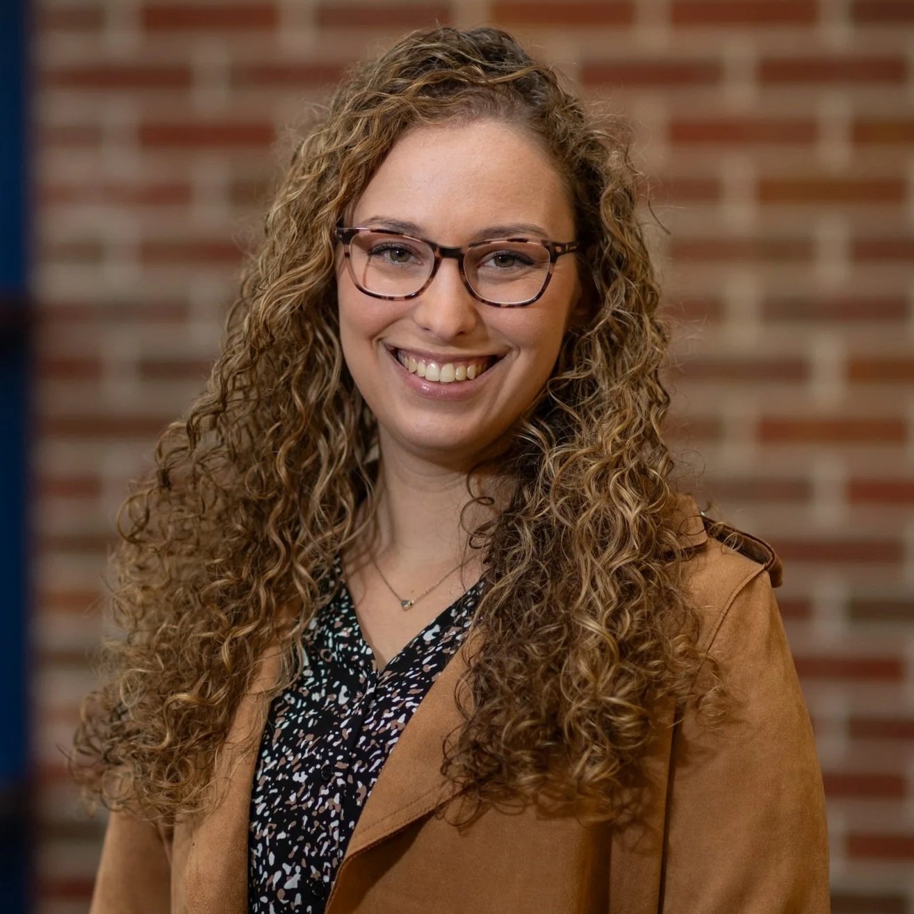 Headshot of Courtney Dennis