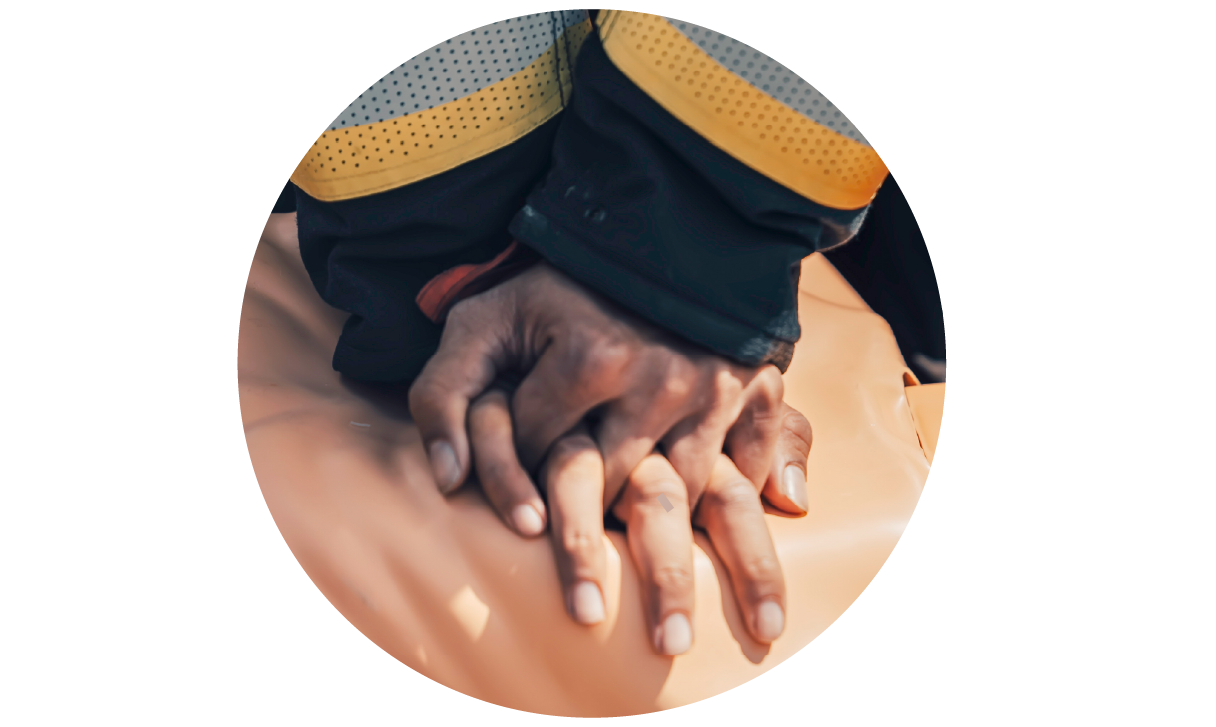 Close-up of an EMS responder's hands performing CPR chest compressions