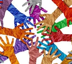 Multiple colorful hands reaching toward the center in a circular pattern.