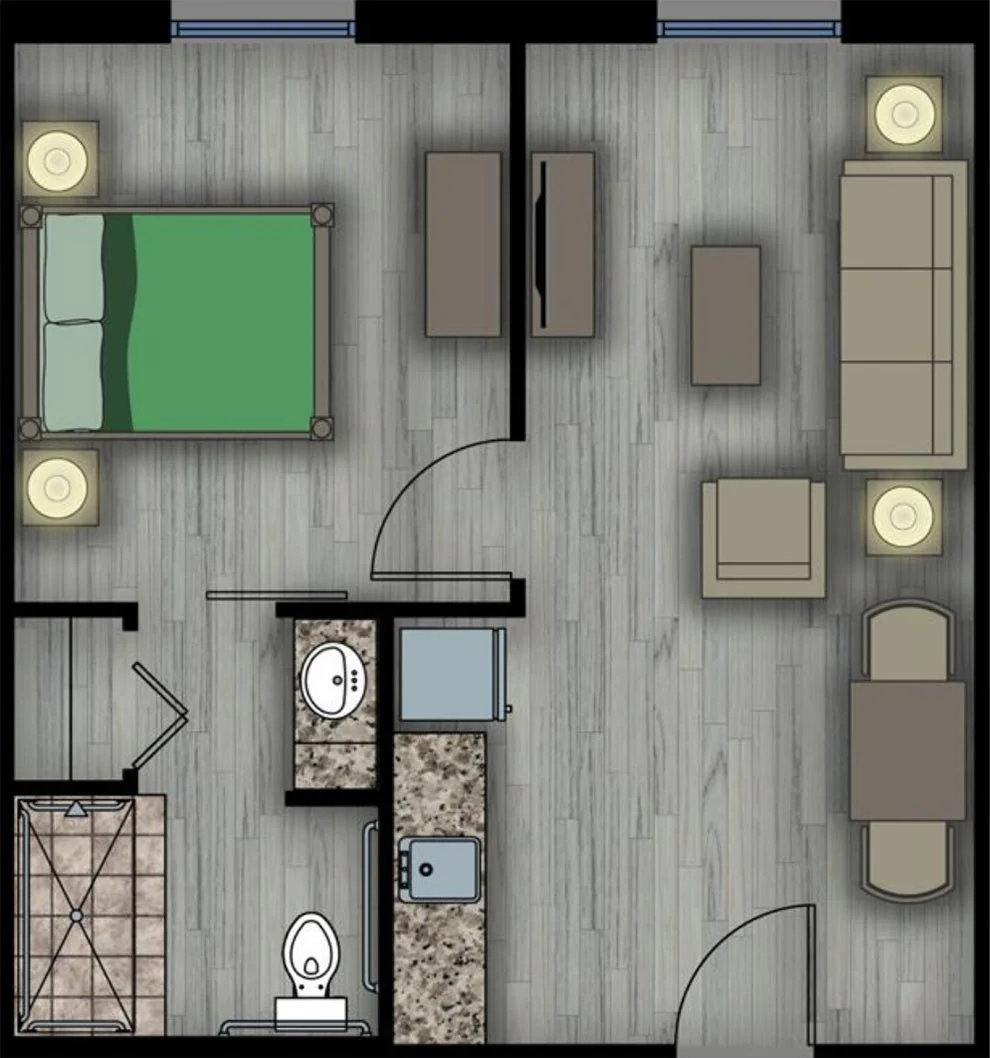 Floor plan of a living space with a bedroom, bathroom, and living area. The bedroom has a bed with two nightstands. The living area includes a sofa, armchair, coffee table, and TV. The bathroom has a toilet, sink, and shower. The kitchen has a countertop with a sink and stove.