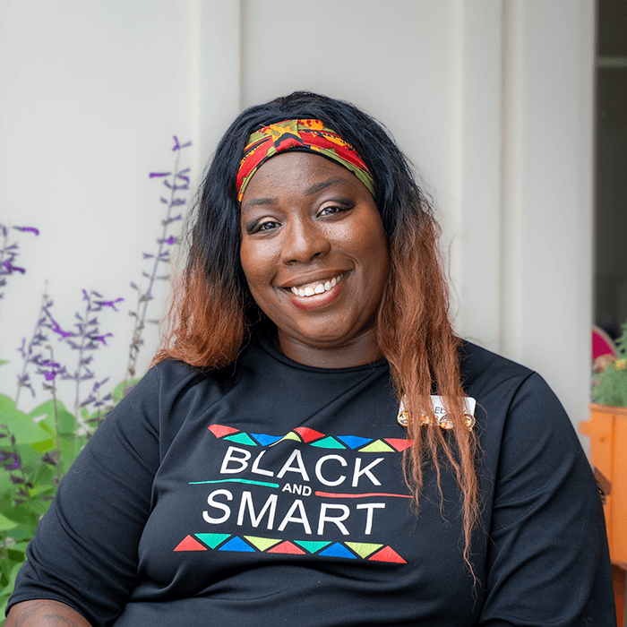 Ebony Brinson-Moss, Activities and Event Coordinator at Bella Groves, leading engaging memory care activities for residents in our residential dementia care community.