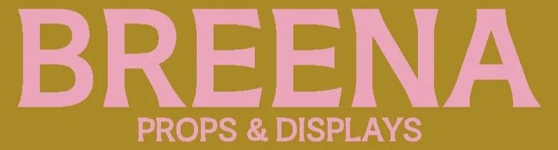 Logo for Breena Props & Displays with large pink text on a gold background