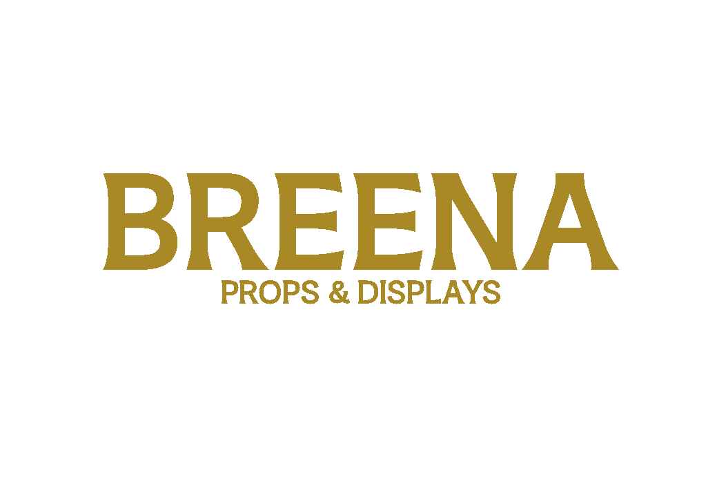 Logo for Breena Props & Displays with black background and gold text