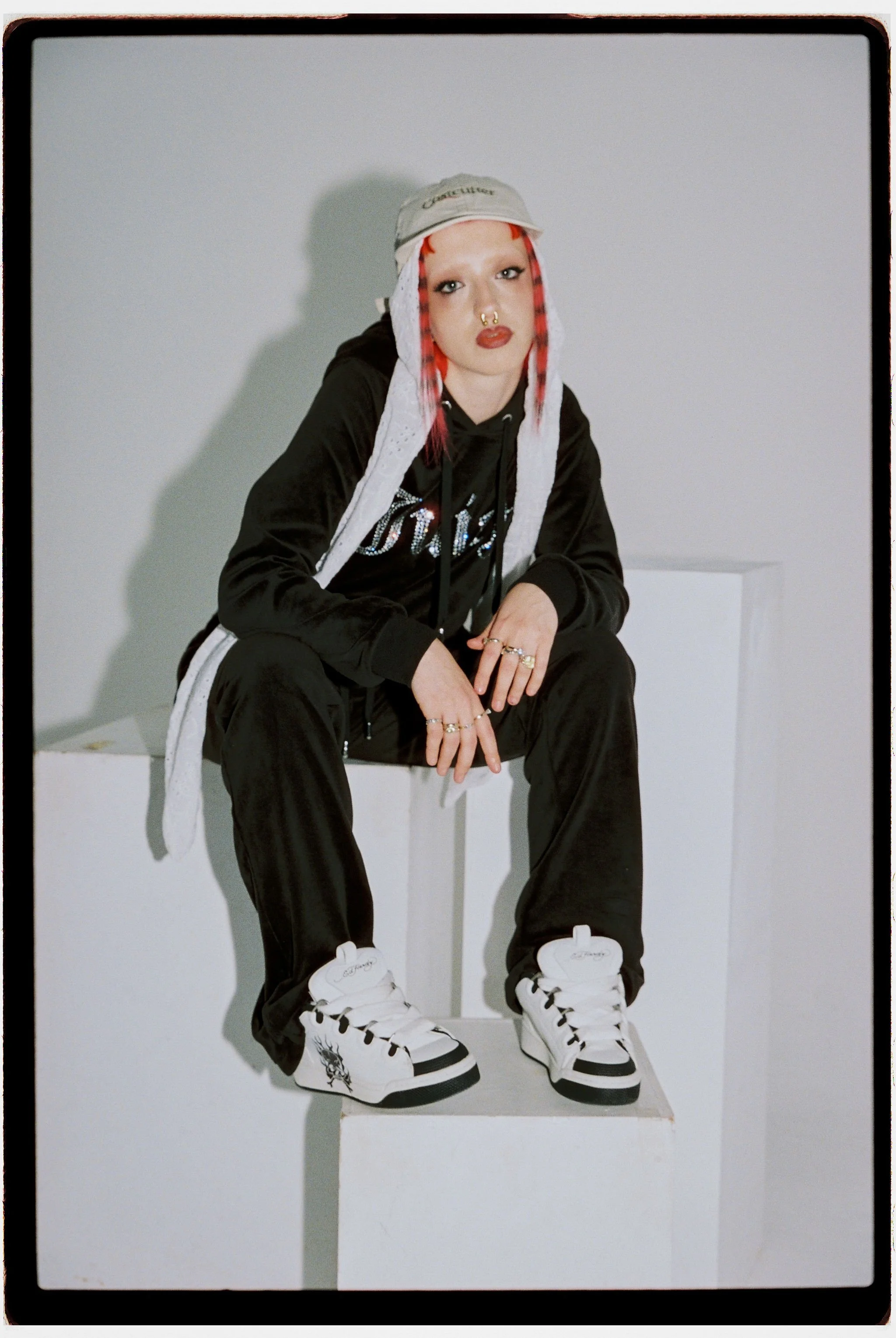   Images above and below, Cody Frost wears -  Tracksuit: Juicy Couture&nbsp;@juicycouture | Bonnet: Trinity Key&nbsp;@nostarsinlondon | Cap: stylist’s own Trainers: Cody’s own 
