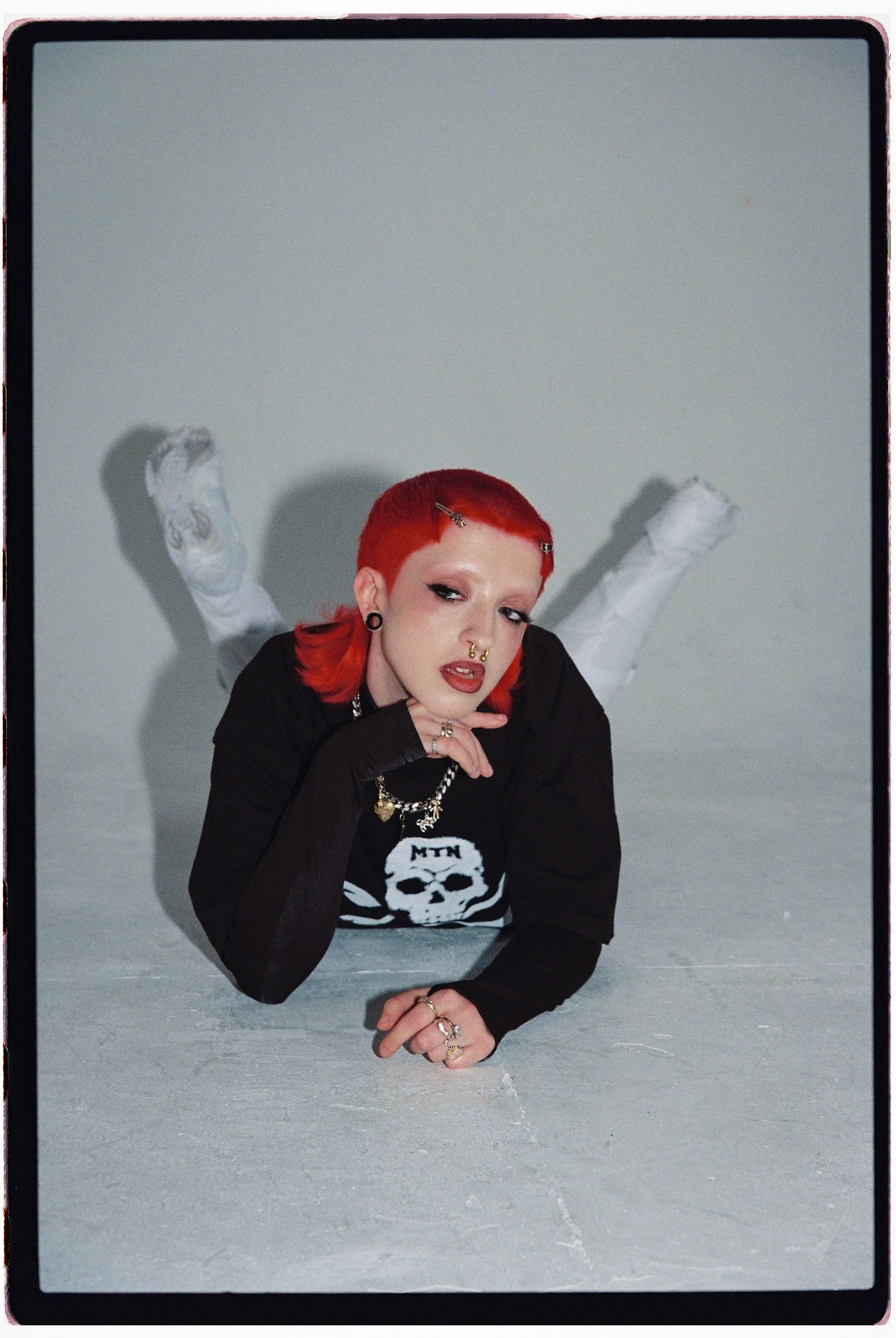   mage above and below, Cody Frost wears -    T-shirt: motherlan x vans west end&nbsp;@ourmotherlan | Skirt:&nbsp;eerie&nbsp;and strange&nbsp;@eerieandstrange | Necklace and boots: Cody’s own&nbsp;  