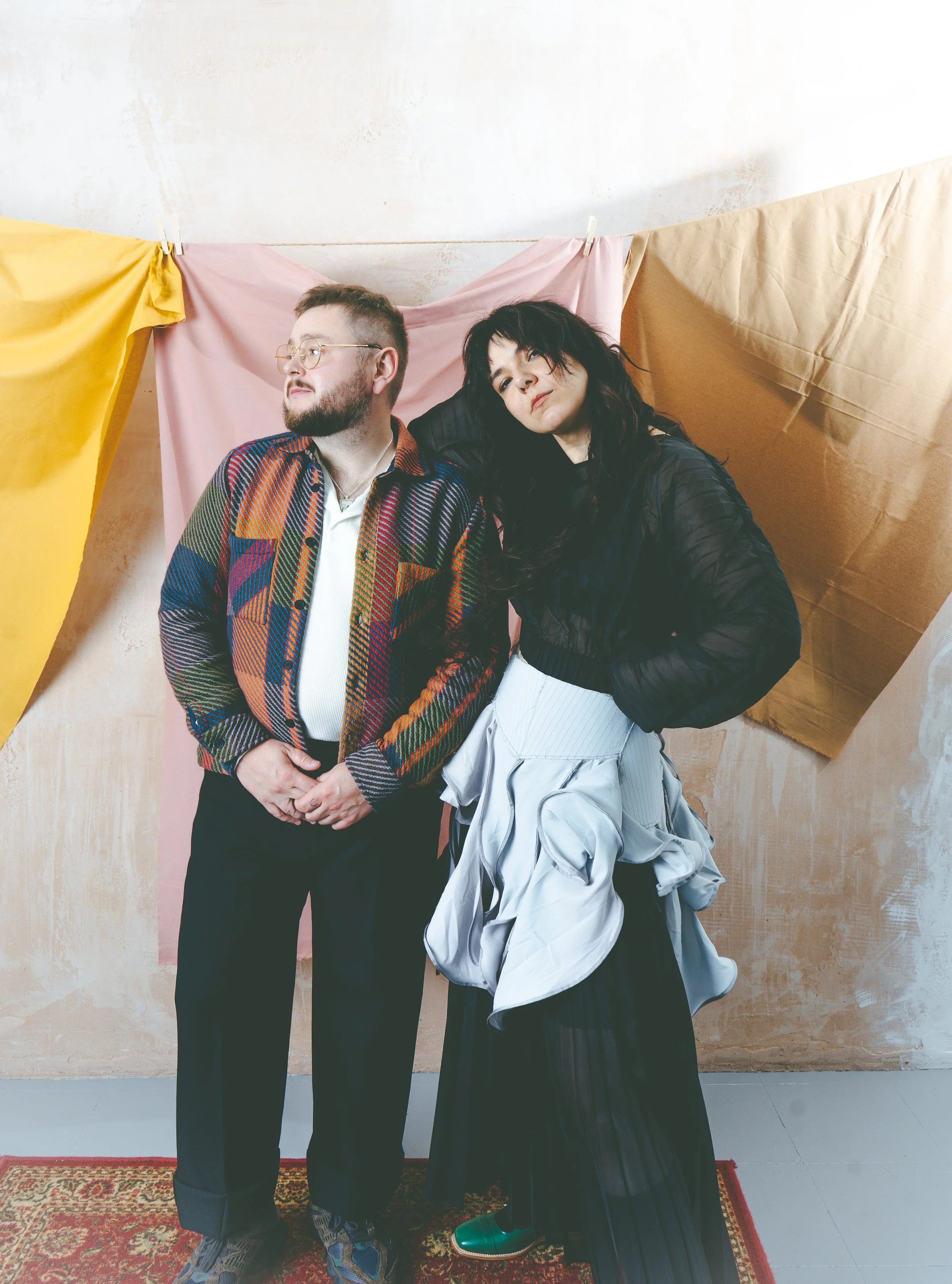   Image Above: Nanna Wears:Top &amp; Skirt - All Saints, Over skirt - Sól Hansdóttir Raggi Wears: Jacket - Wax, Trousers - All saints, T shirt - Wax  