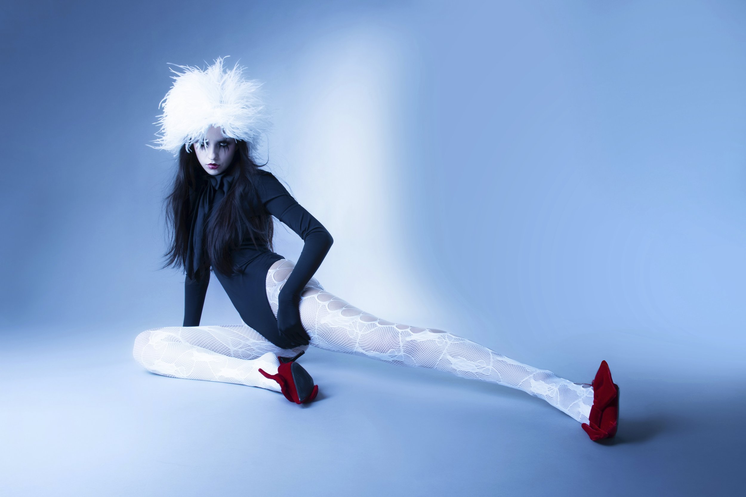   Image Above Charlotte Roberts Wears: Hat: LILLY PHELLERA | Bodysuit: Critter /    223 Agency    | Tights: Stylist Own | Shoes:   &nbsp;Gianvito Rossi     