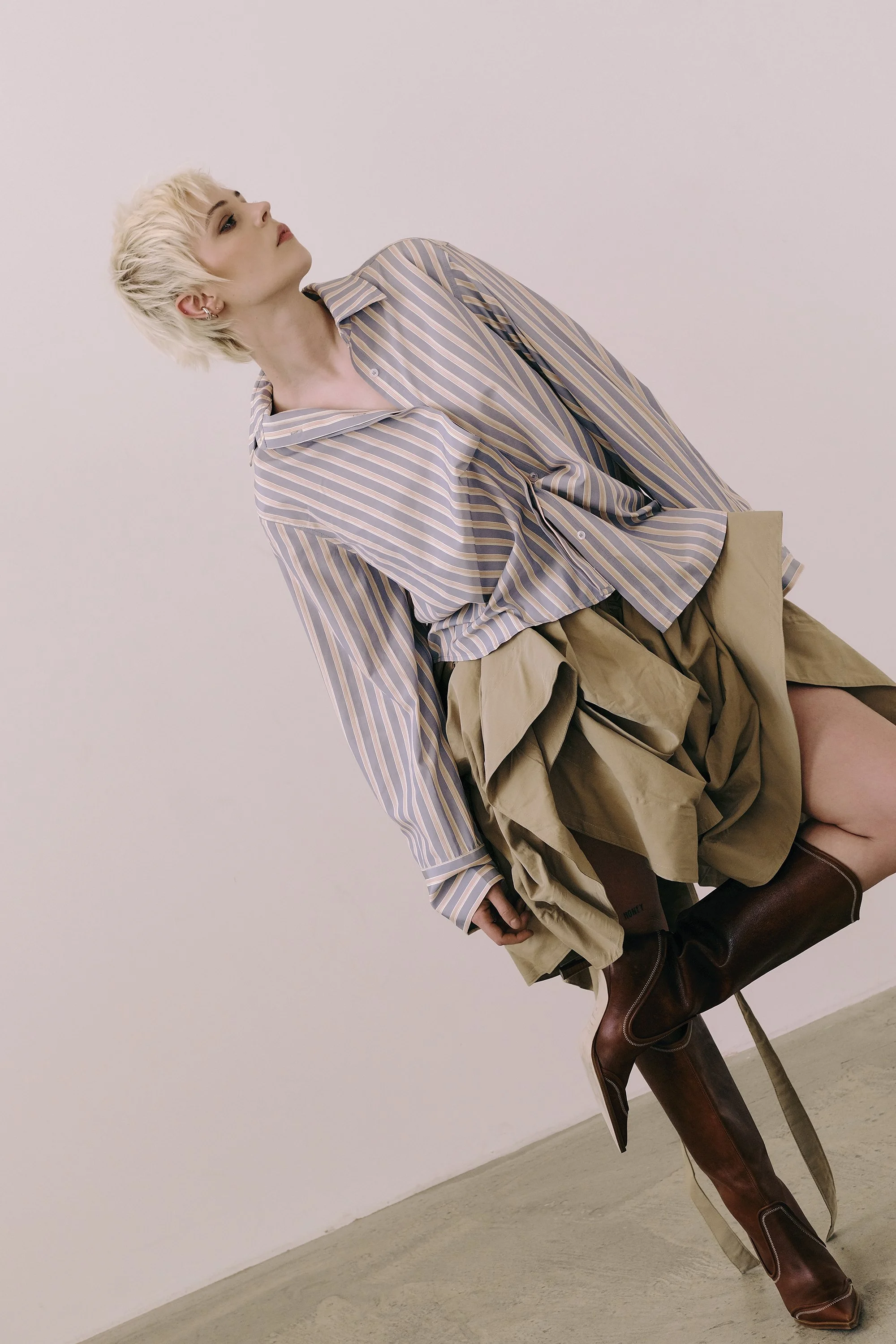   Images Above, Ella Maisy Purvis wears: Shirt:&nbsp;Ports1961&nbsp;Skirt:&nbsp;Joshua J Small&nbsp;Boots:&nbsp;Sergio Rossi  