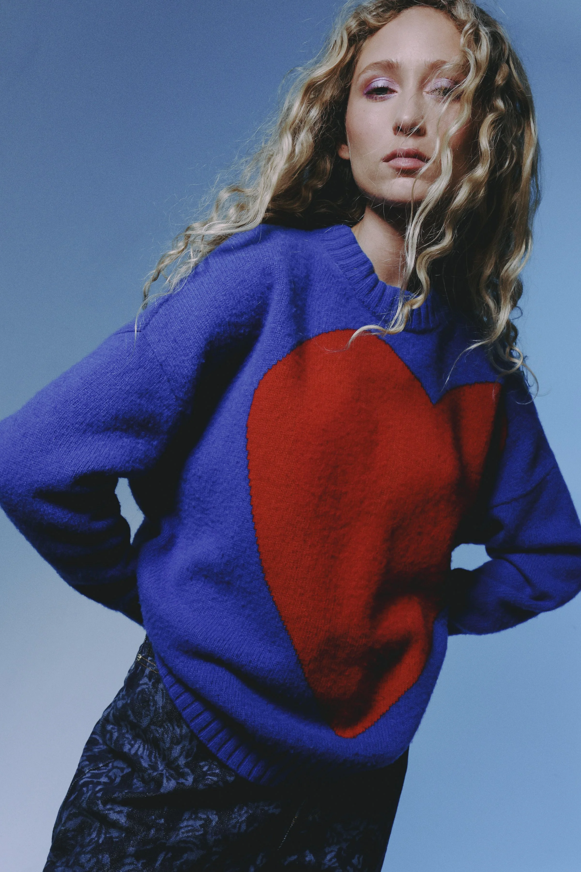   Images Above, Elfie Reigate wears: Jumper: Pleasing | DH-PR, Jeans: Ganni | DH-PR, Shoes: Vagabond | Canoe Inc  