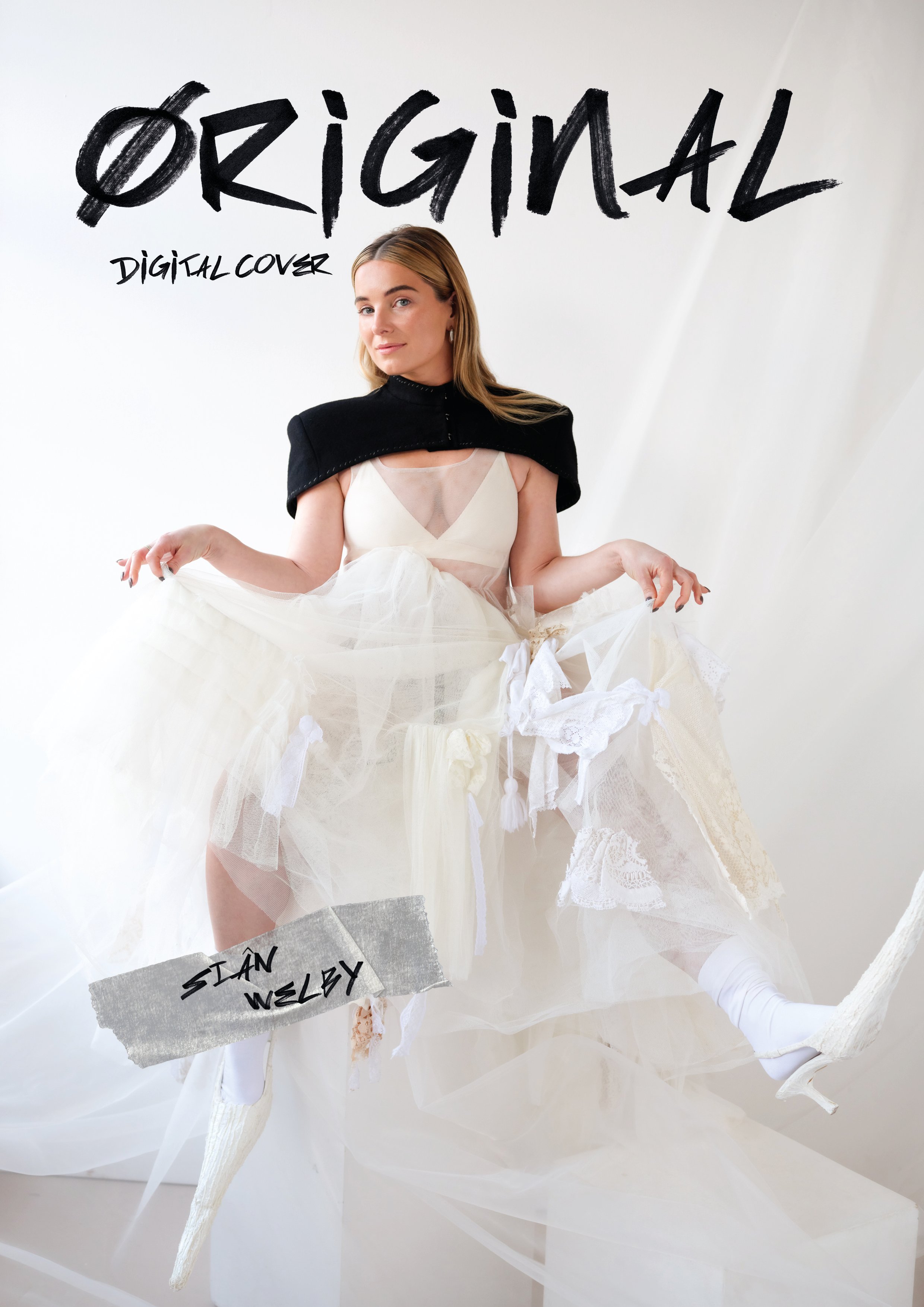   Image above and below, Siân Welby wears -  Dress:    Victoria Olejniczak    | Cape:    Acidsiiia    Earrings:    Louur     | Shoes:    Mireille Demirci    | Bra &amp; socks: Stylist’s archive  