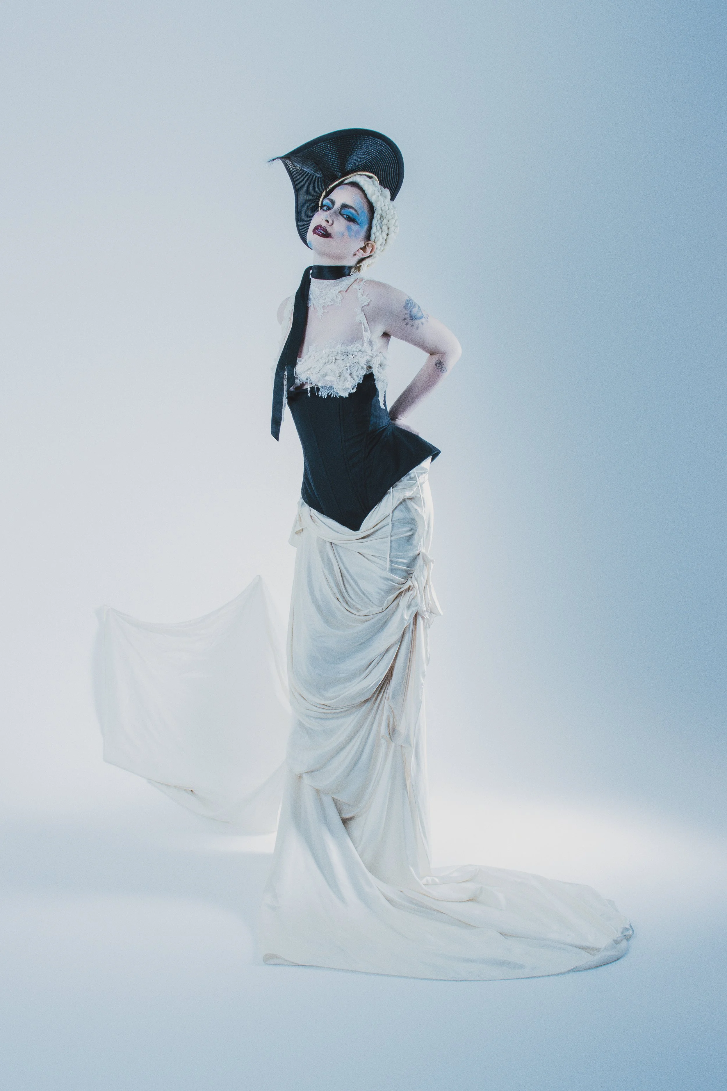   Abby Roberts wears, Skirt &amp; Top: Dreaming Eli, Corset: PATIENT Z, Headpiece: Katherine Elizabeth  