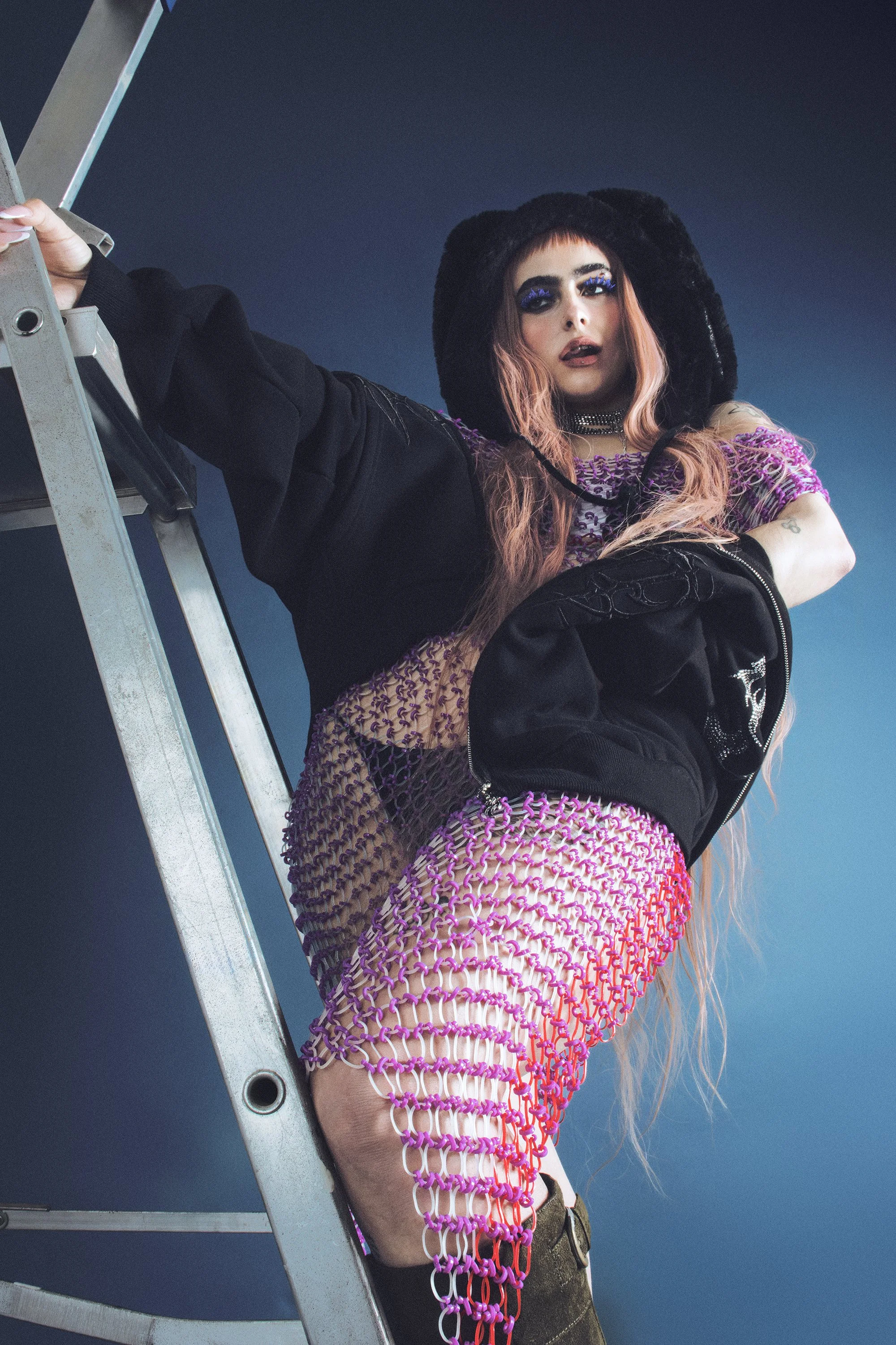  Lozeak wears, Hat: Stella Xingyi, Dress: Anna Dewhirst, Necklace: Rebel Rose, Jumper: Named Collective  