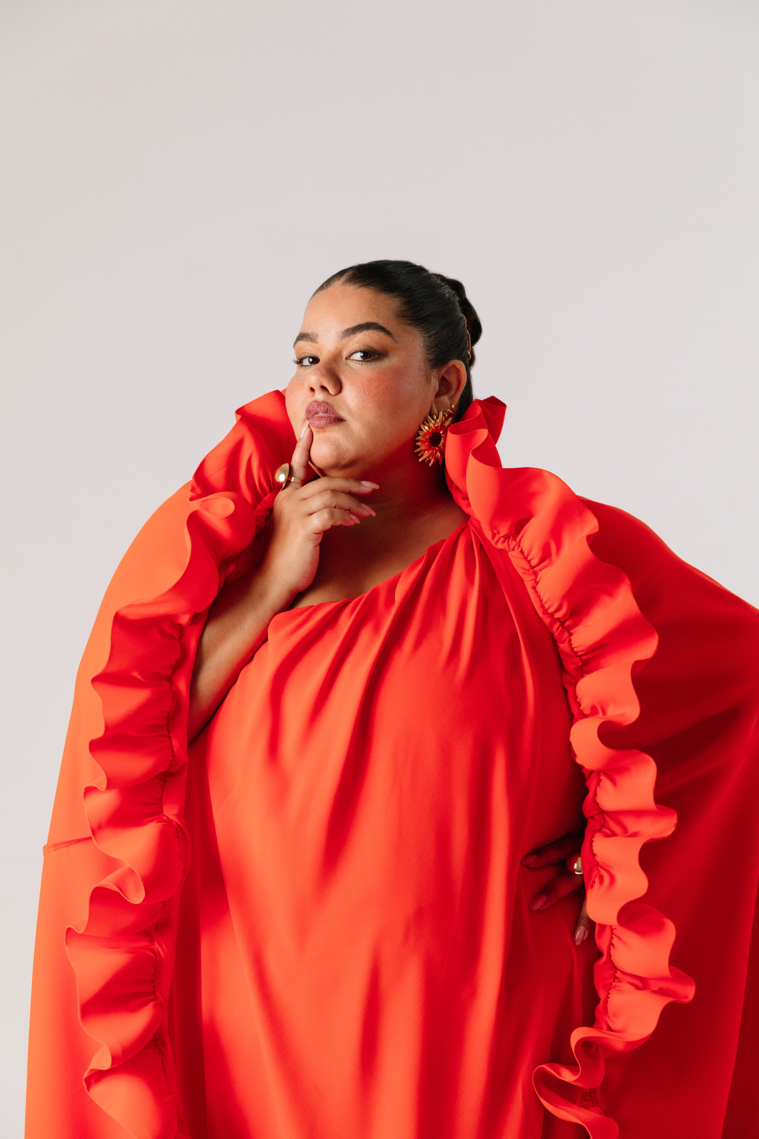   Priscilla Del Castillo wears; Dress: Eloquii  