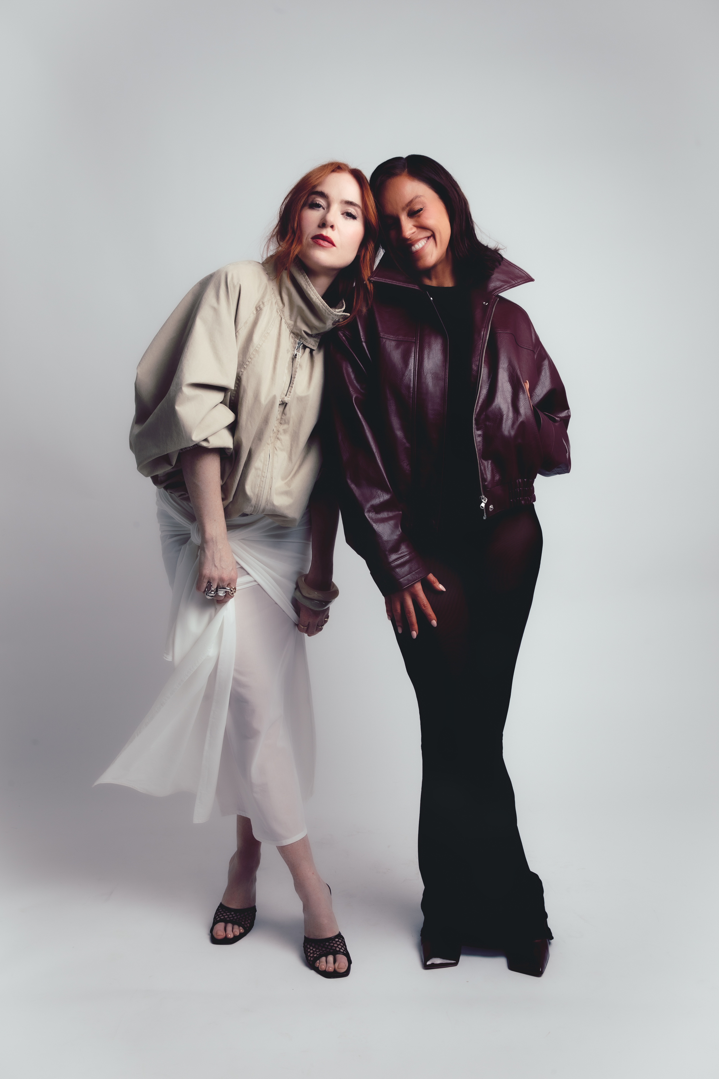   Angela Scanlon wears, Jacket: Free People, Dress: KADE, Shoes: Amina Muaddi. Vicky Pattison wears, Jacket: Glassworks, Dress: KADE, Shoes: Amina Muaddi  