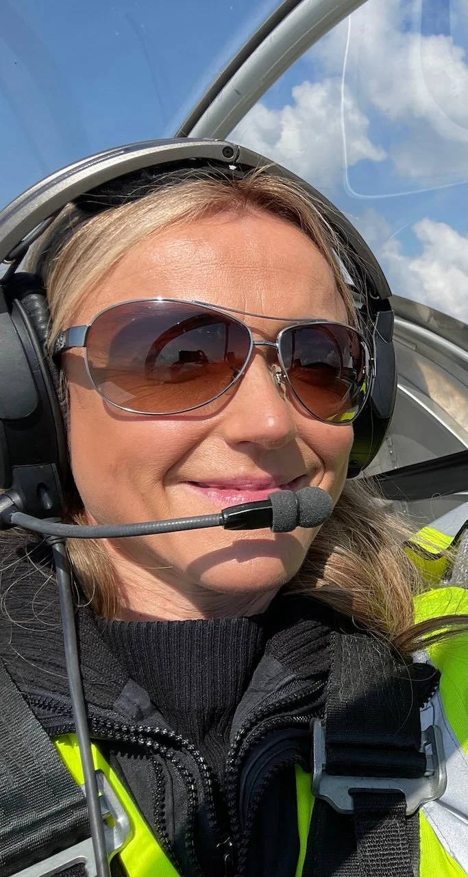 female-author-hchannah-headshot-wearing-aviation-headset