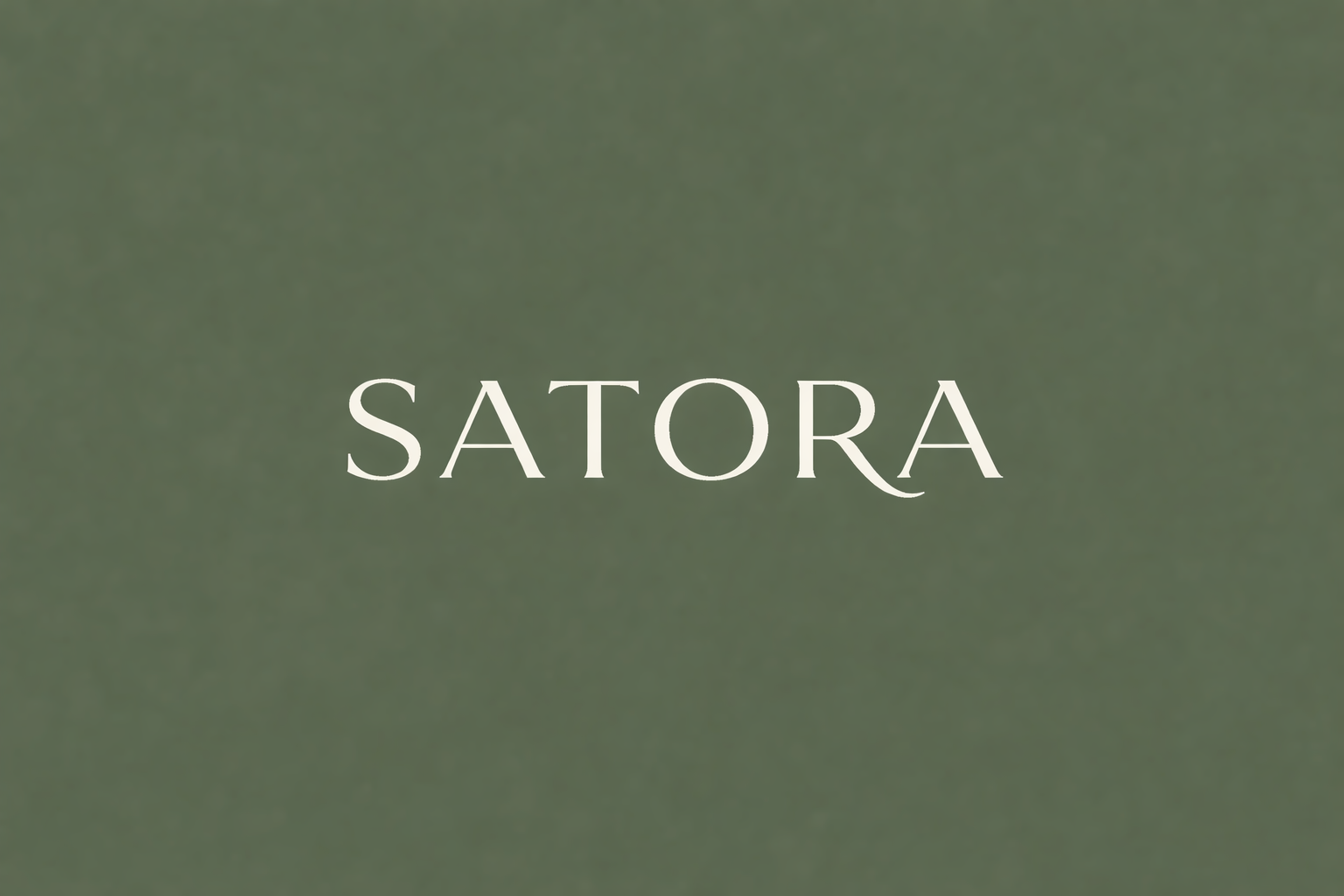 The word 'SATORA' written in white over a blurred green background.