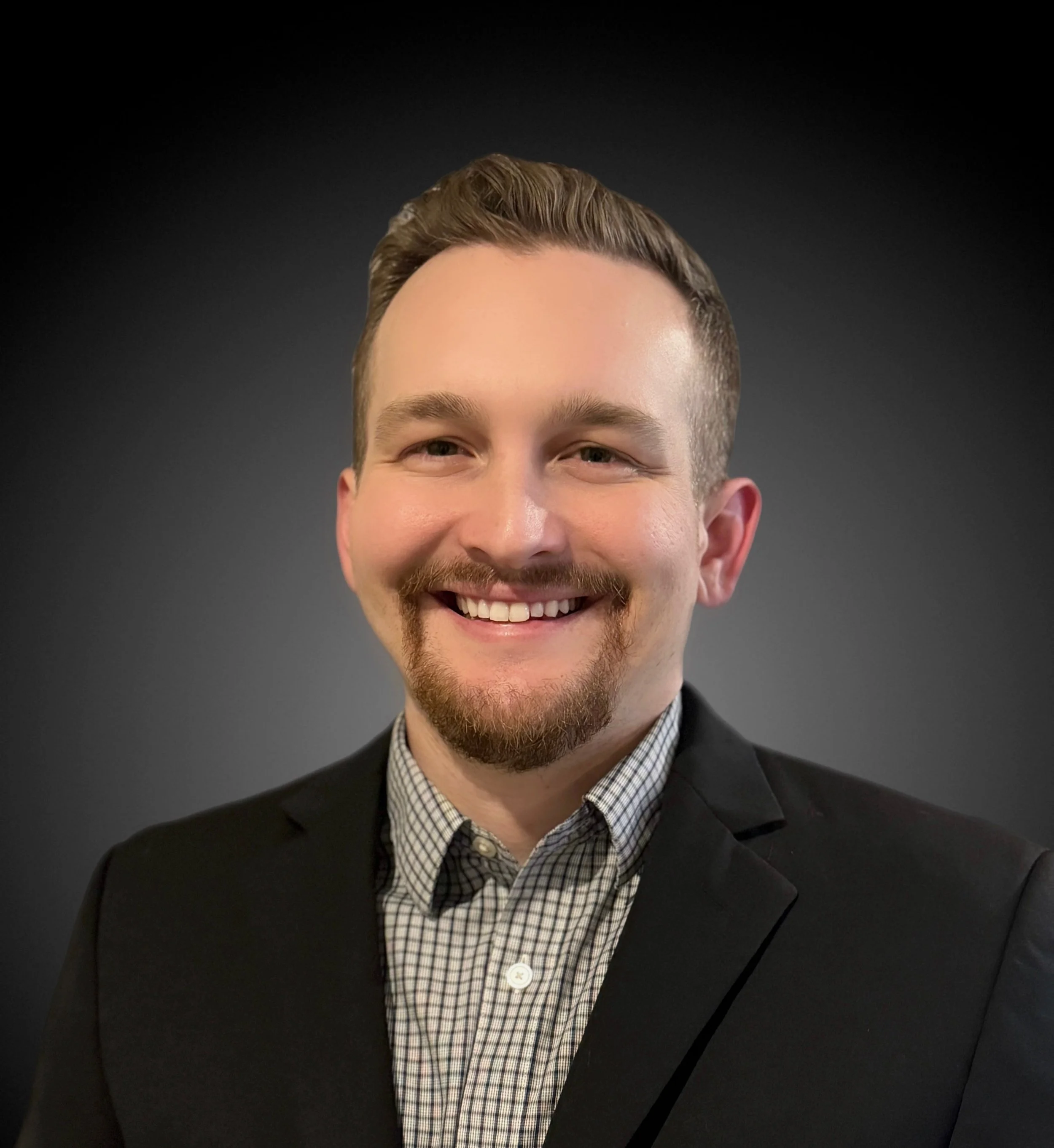 Professional headshot of Payton Snell, Founder and M&A advisor