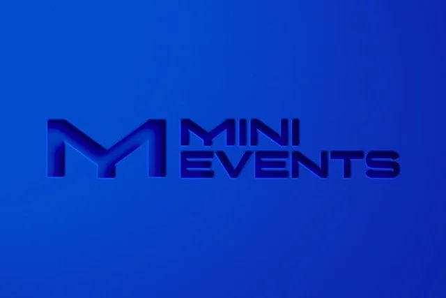 Blue background with the text 'MINI EVENTS' and a stylized letter 'M' logo.
