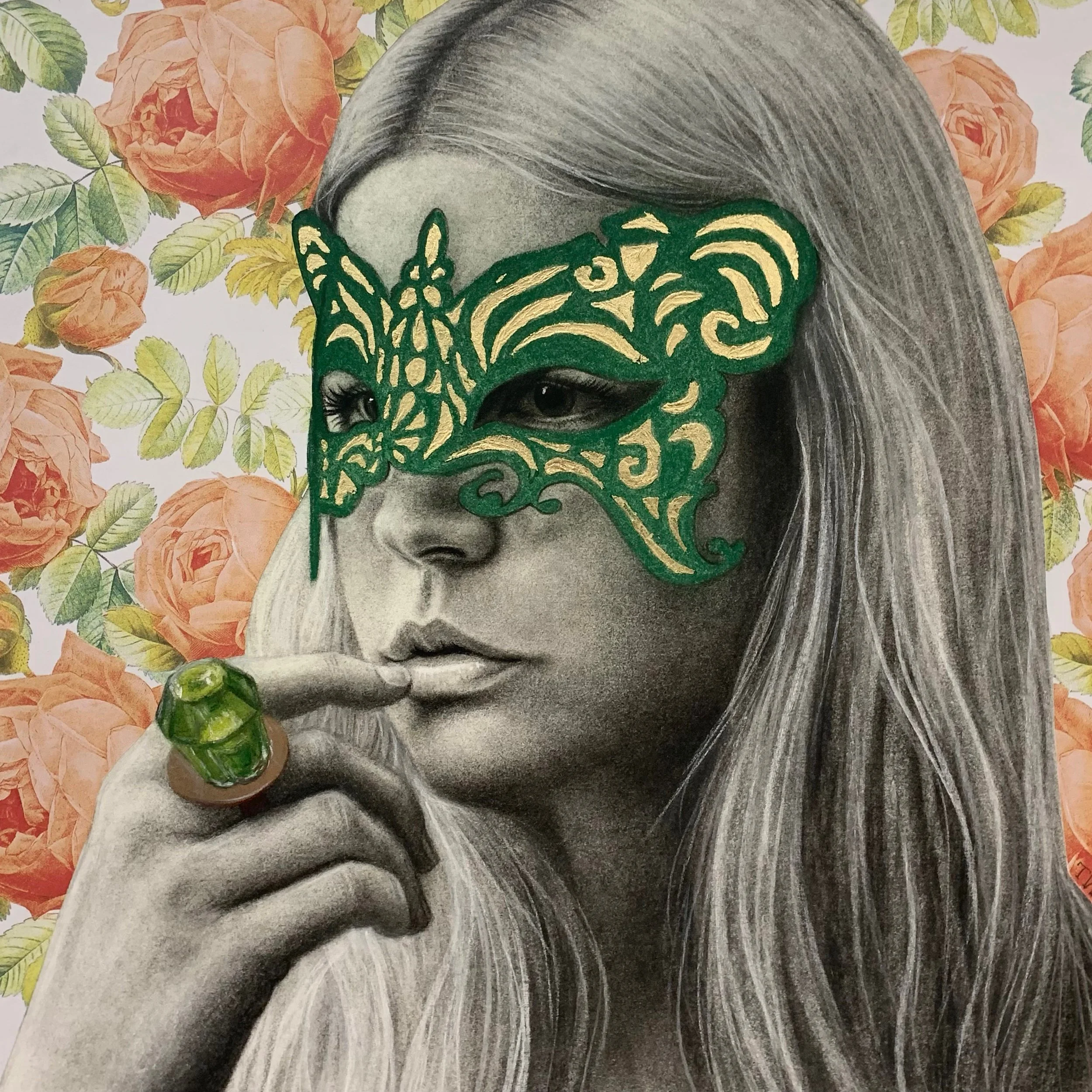A grayscale portrait of a woman with long hair, wearing an ornate green and gold mask covering her eyes and upper face, holding a green ring with a large gemstone on her finger, with a background of orange roses and green leaves.