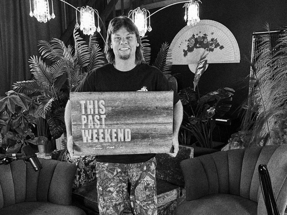 Theo Von holding up his This Past Weekend Sign In Toronto