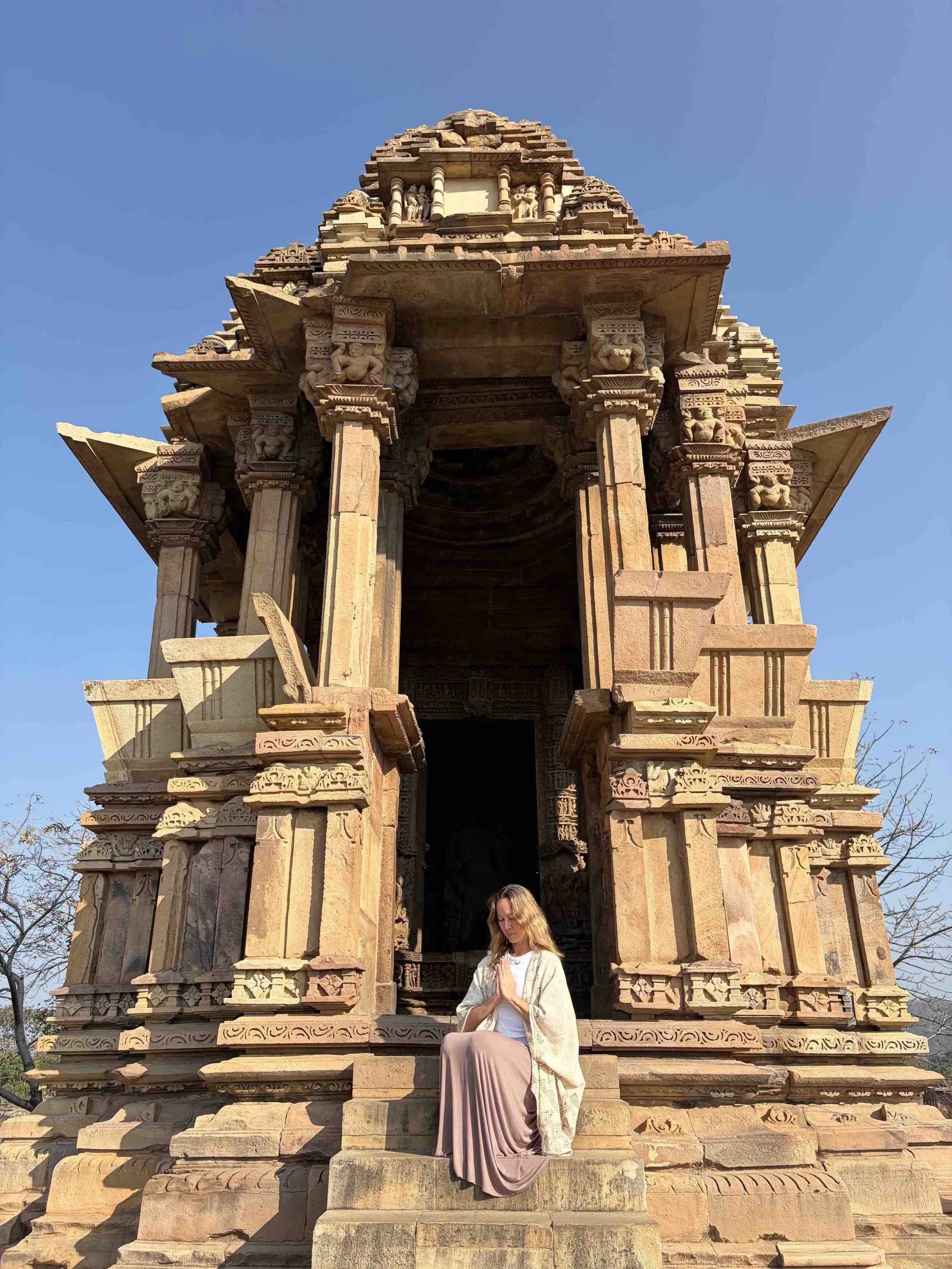 Steph Chee standing on an Asian temple