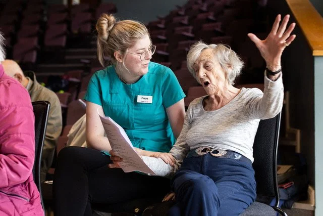 Moving Music - singing lady with a carer