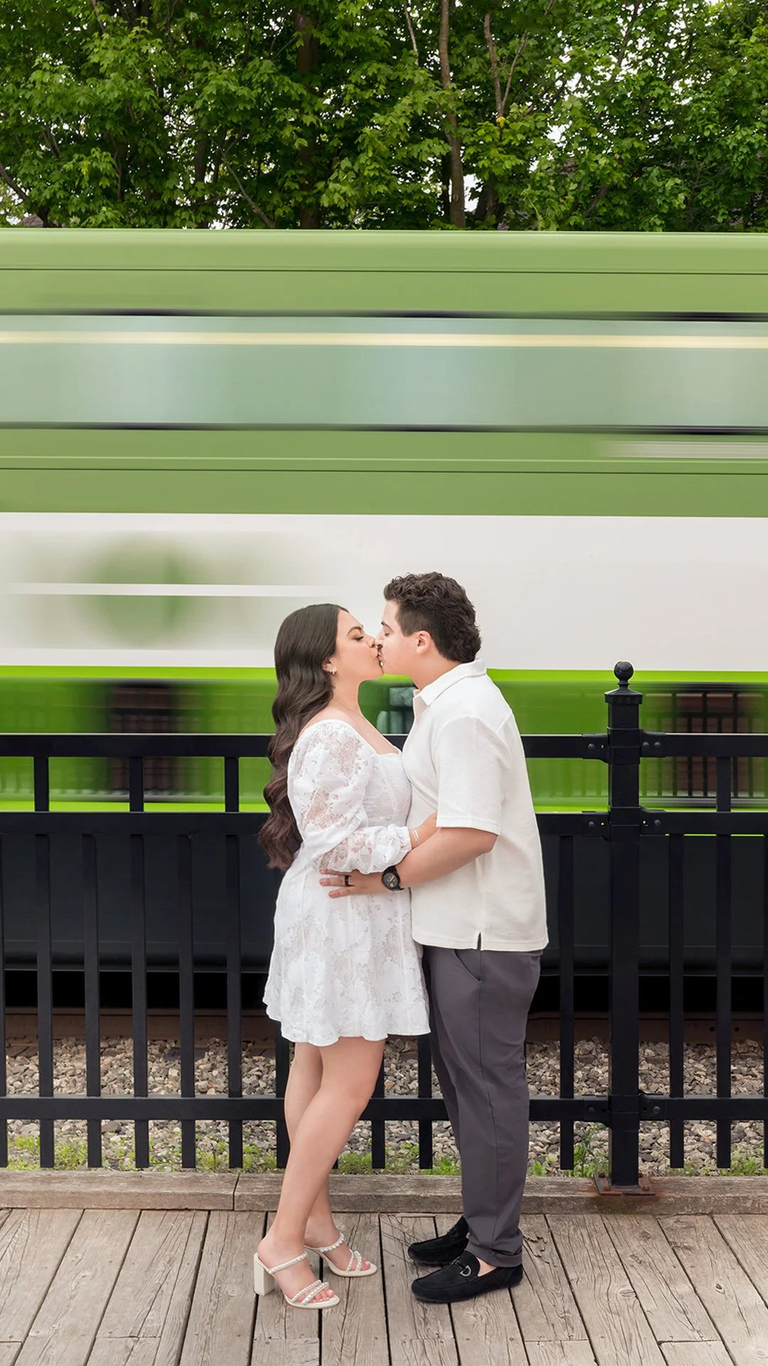 Unionville  Main Street Engagement Session with blurred GO train