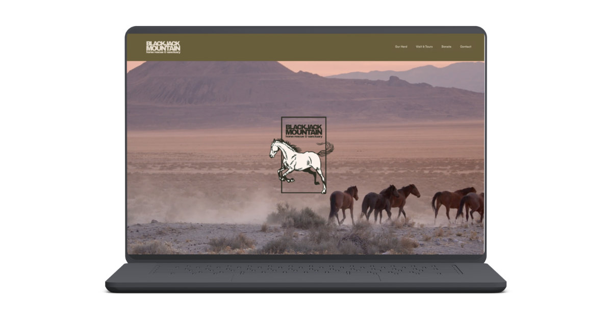 A laptop screen displays a desert scene with horses riding across the landscape and a logo for Blackjack Mountain.