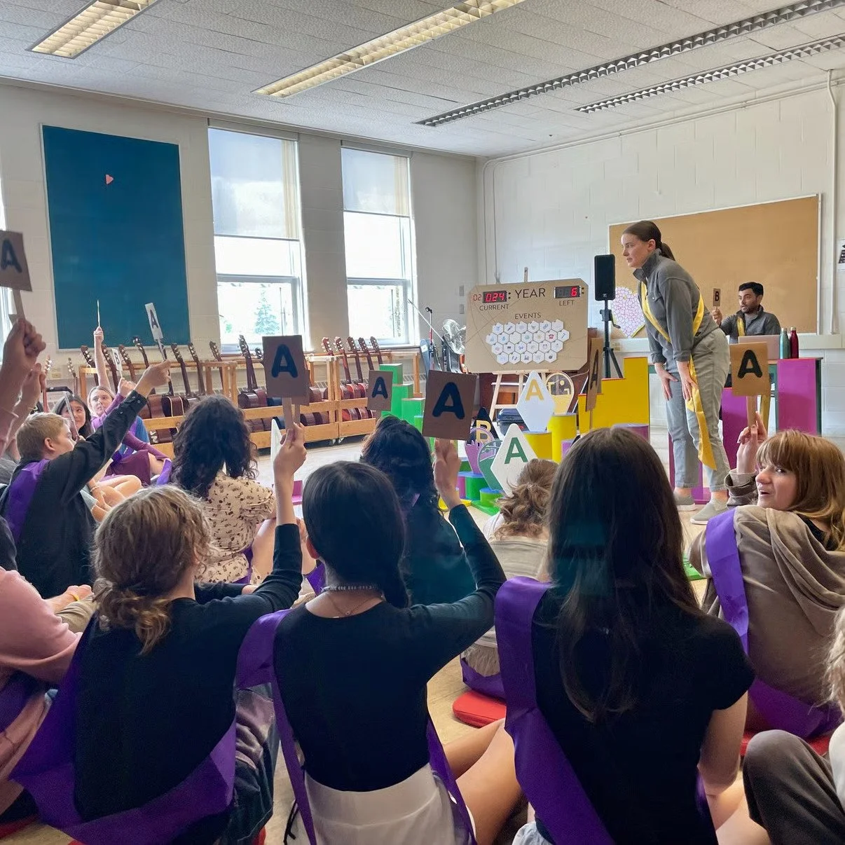 Breanne Tice and Deivan Steele performing The Assembly in a school