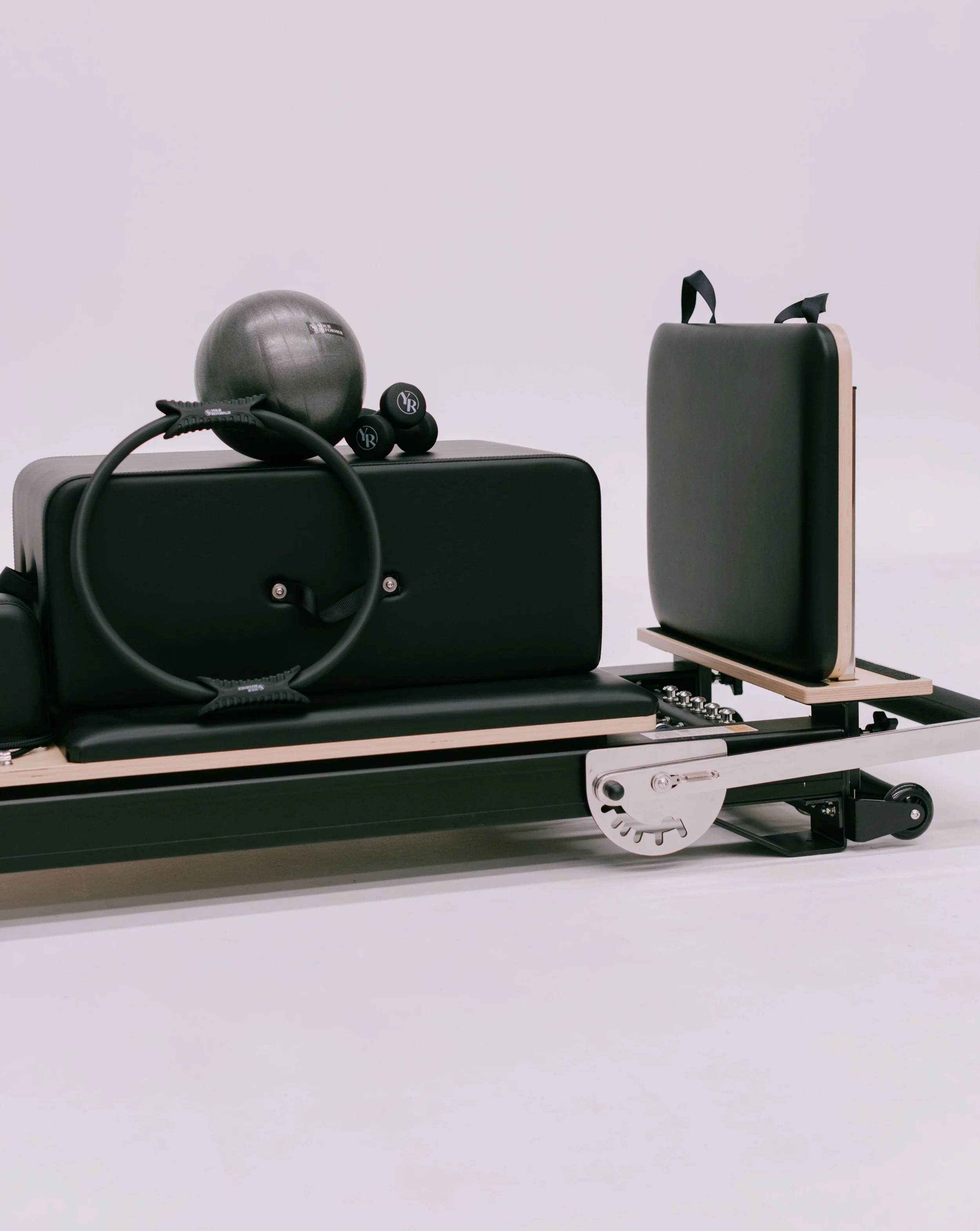 A picture of The Studio X reformer pilates machine by Your Reformer. This is the luxury reformer that will be used at Worth It: A Reformer Pilates Studio in Keller Texas.