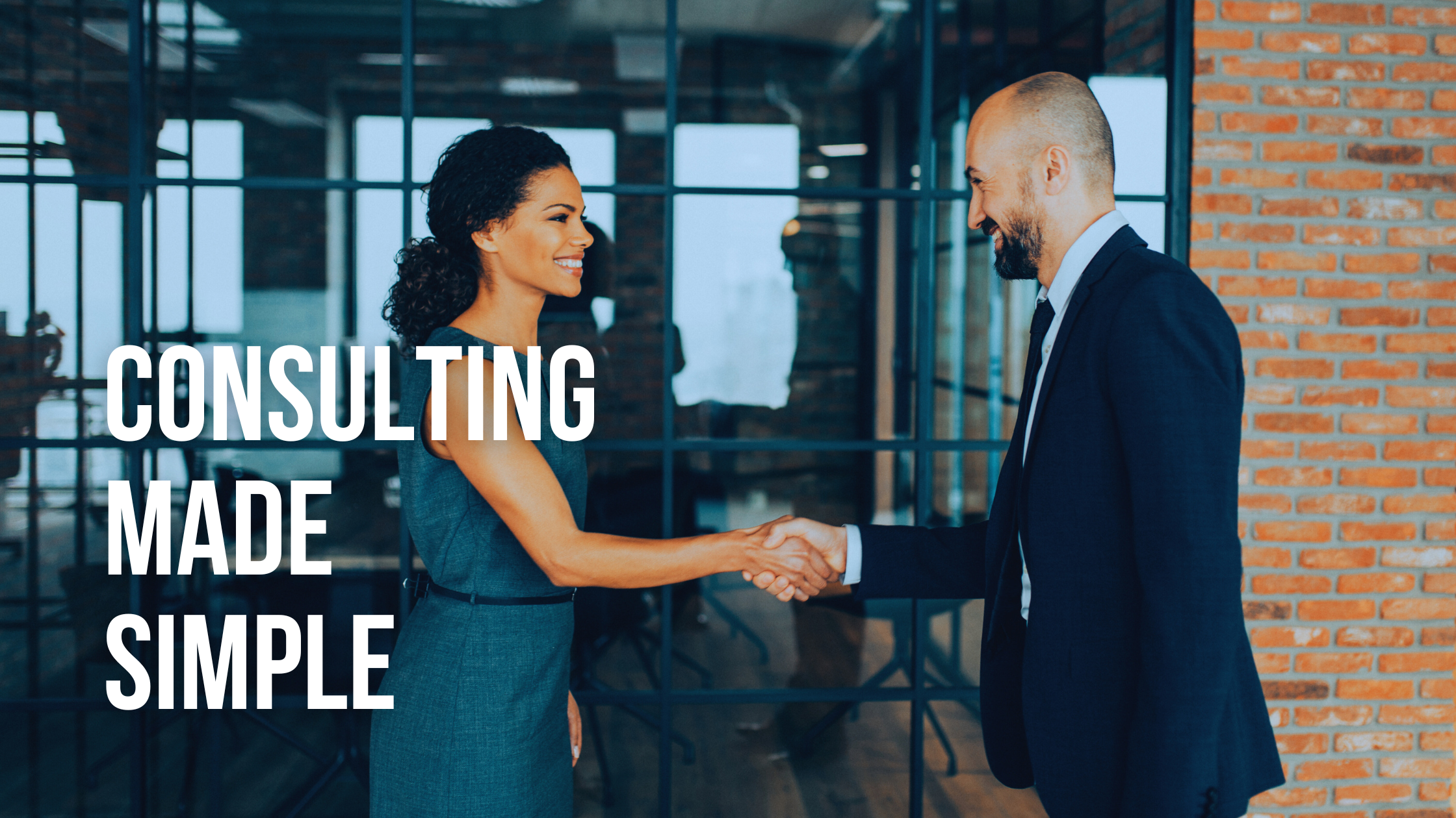 A man in a suit and a woman in a dress shaking hands in an office setting, with the words 'Consulting Made Simple' overlayed.